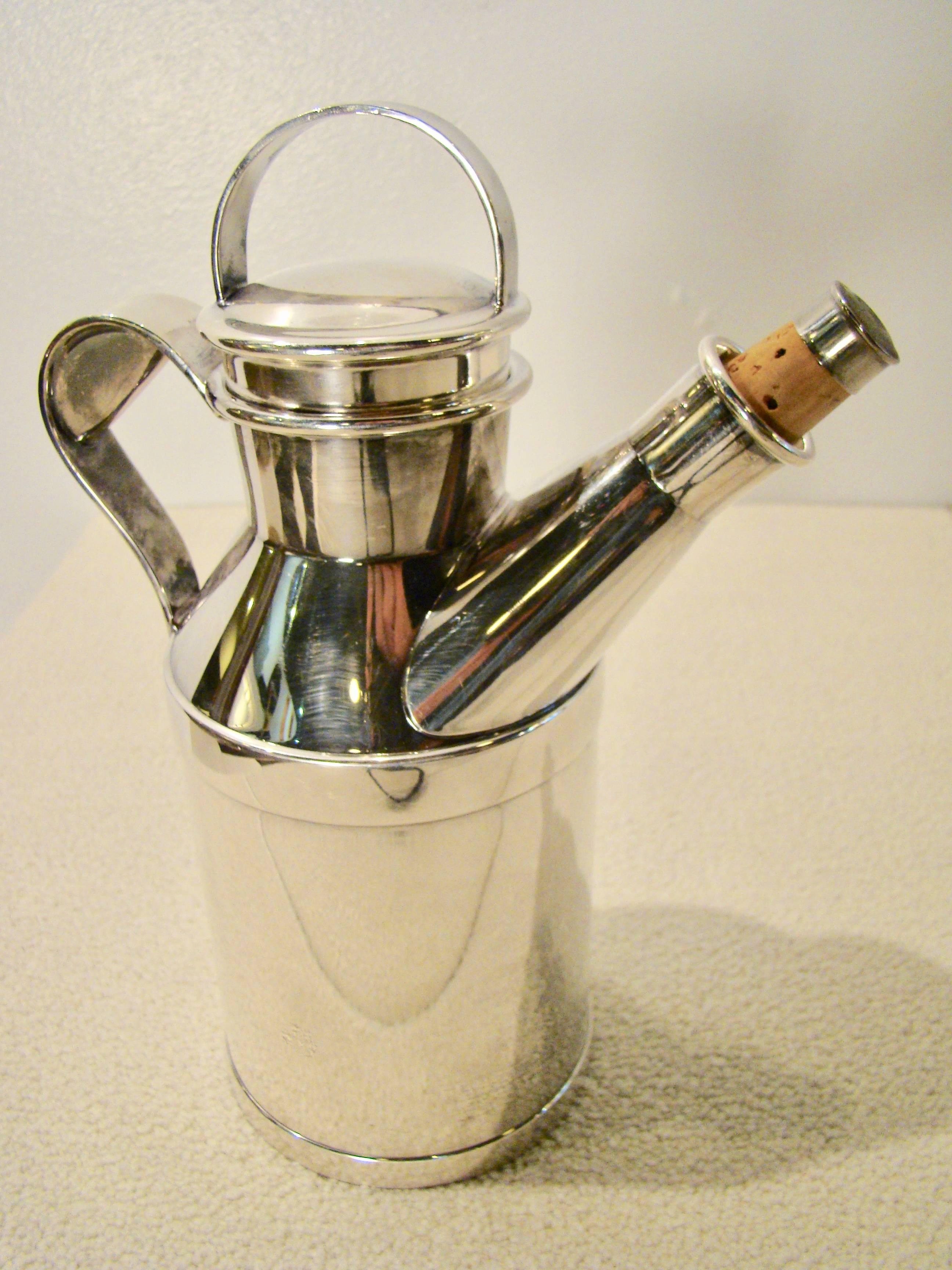 Beautiful nickel plate cocktail Shaker in the form of a milk can by Reed and Barton. Produced in 1938 and difficult to find. Reed and Barton paper stamp is on the bottom along with the Denver Co. retailer. Displays beautifully and a must have for