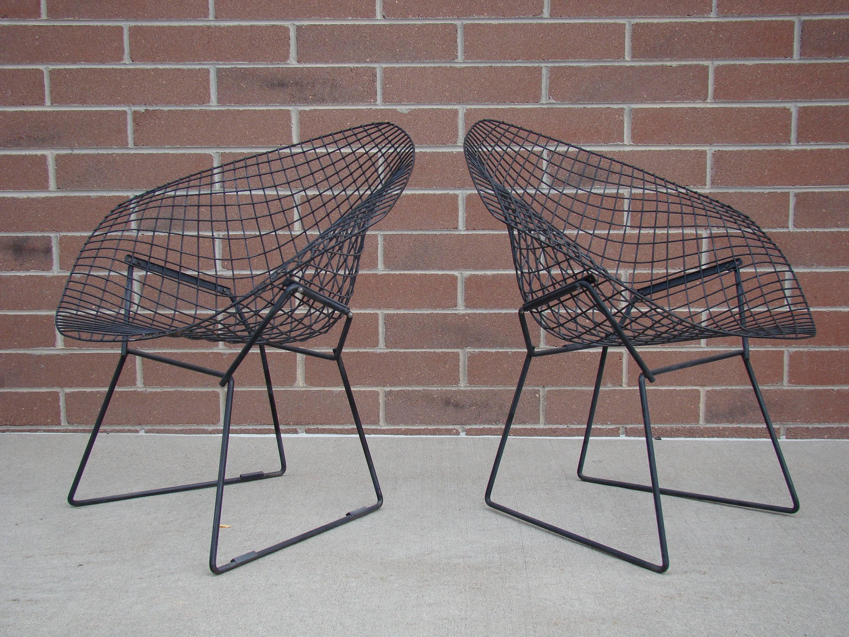 Early pair of Harry Bertoia black wire chairs for Knoll, circa 1950s.