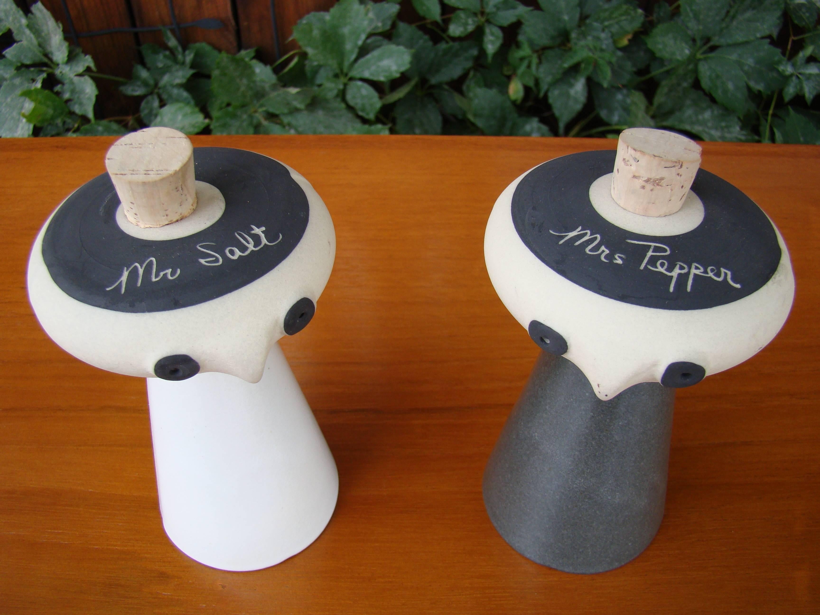 Large and playful, this fine 'studio ceramic' salt and pepper service is beautiful, amusing and functional all at once. Designed by David Gil in the early 1960s for the Bennington Potters in Vermont. Salt and pepper easily fill at the top and