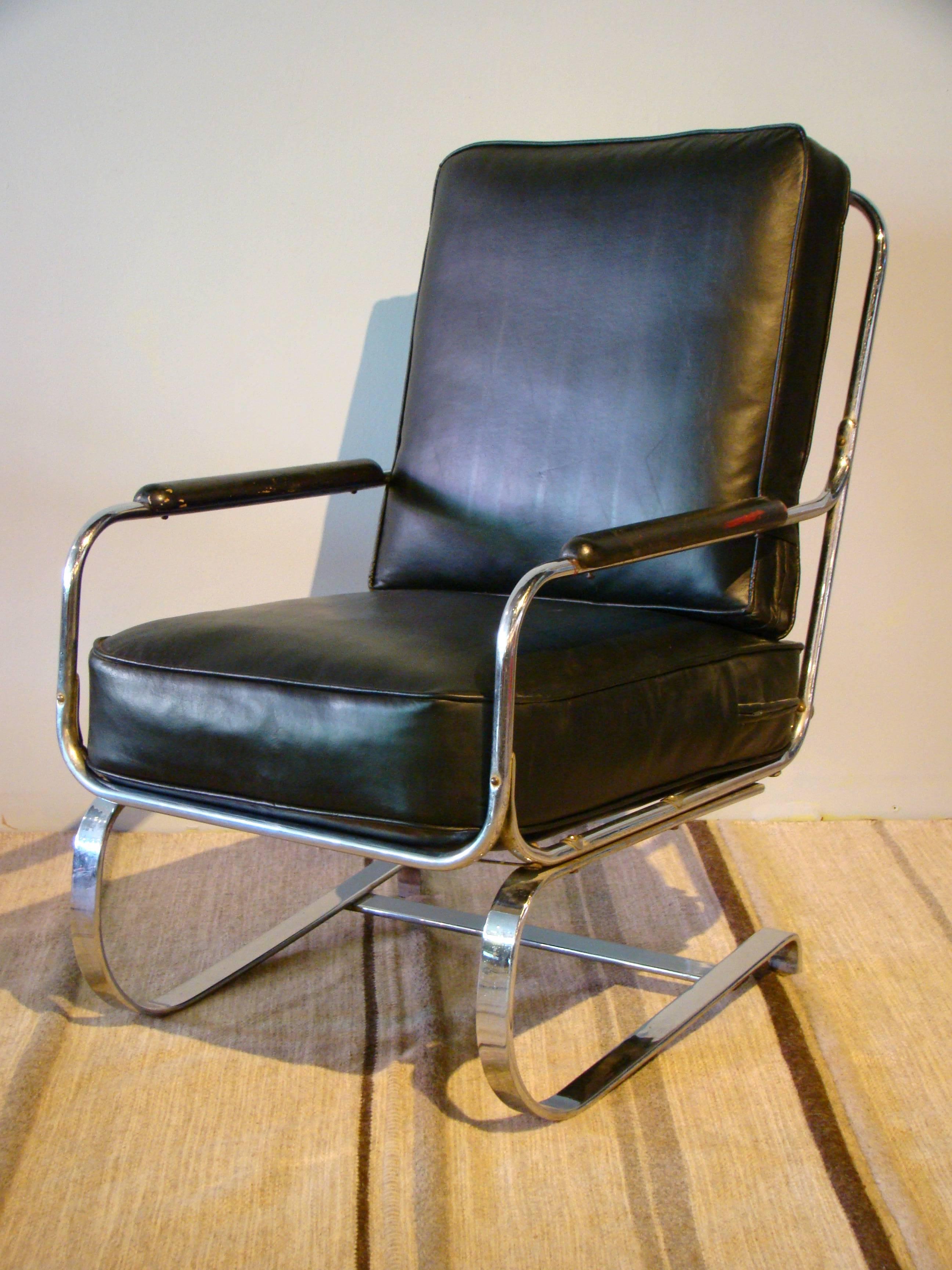 KEM Weber designed this Avant Garde lounge chair in the 1930s. It sits on flat bands of chrome and acts as a rocking chair. Superbly attractive and equally as comfortable.