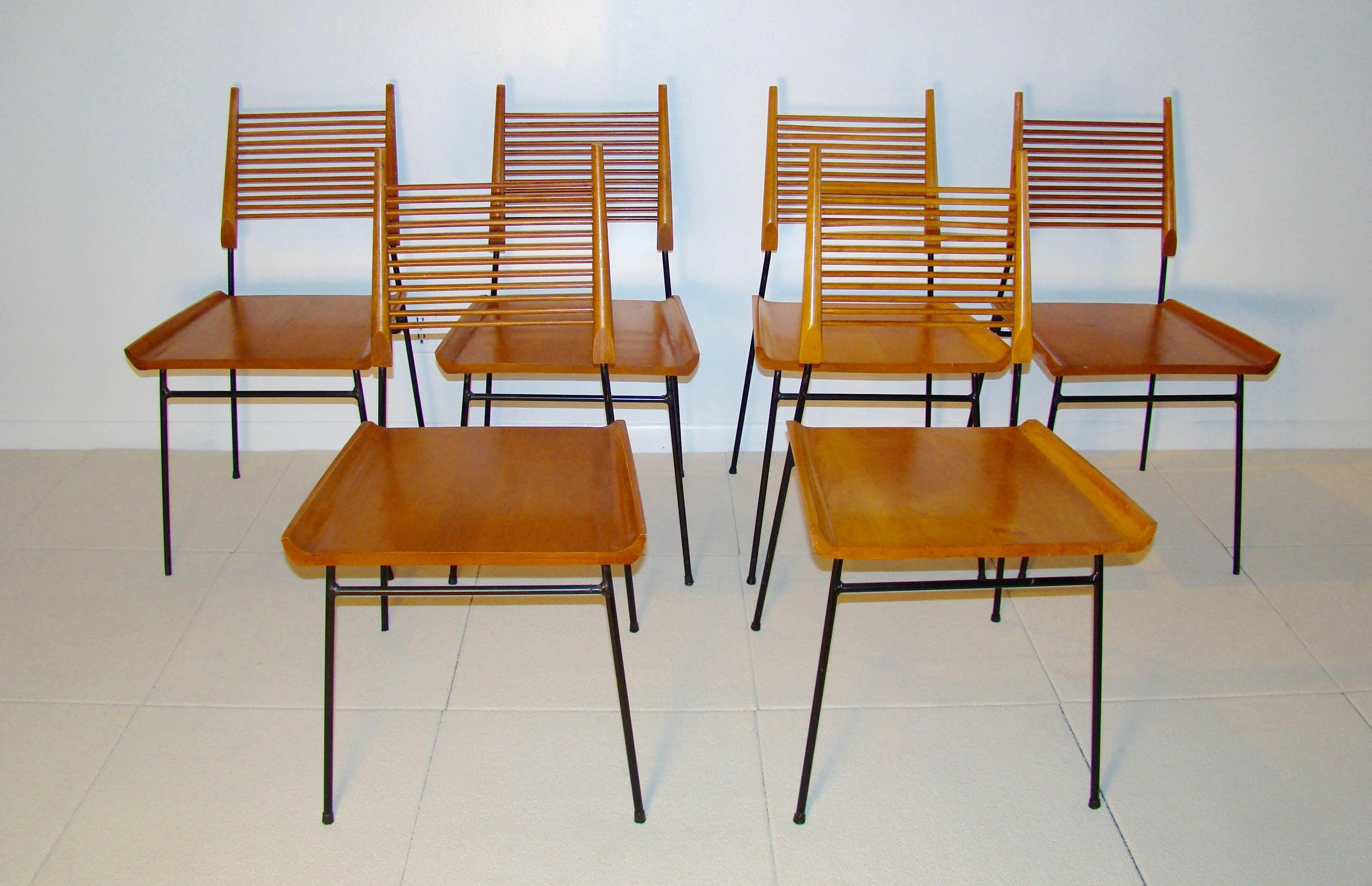 Exquisite set of six Paul McCobb wrought iron and maple ladder back or shovel chairs for Winchendon, circa 1950s. Beautiful form, comfortable. Arguably, one of Paul McCobbs' most brilliant designs.

This set of six chairs is in exceptional