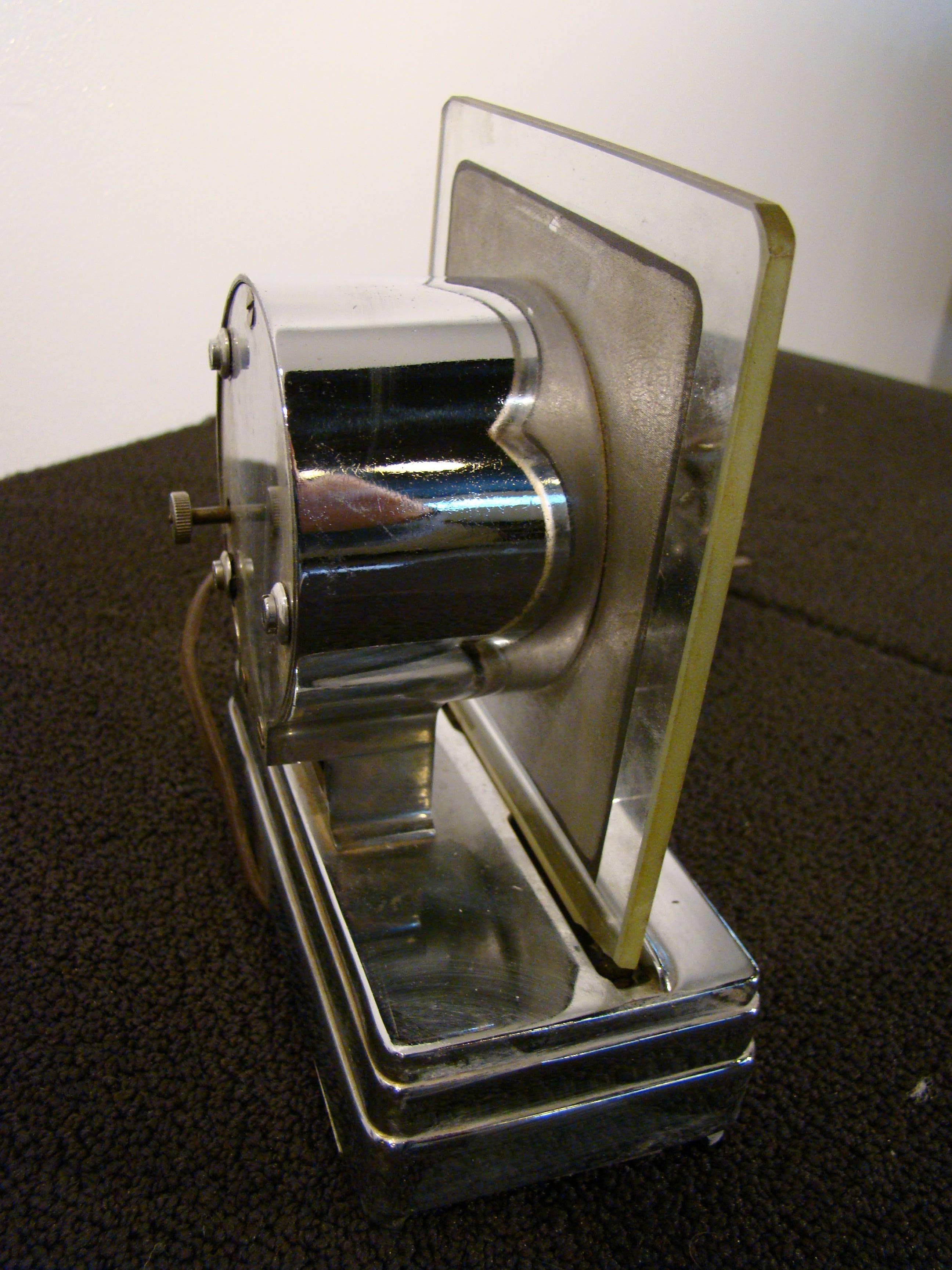 Mid-20th Century Art Deco Machine Age Viking Moon Glo Lighted Electric Mantle Clock For Sale