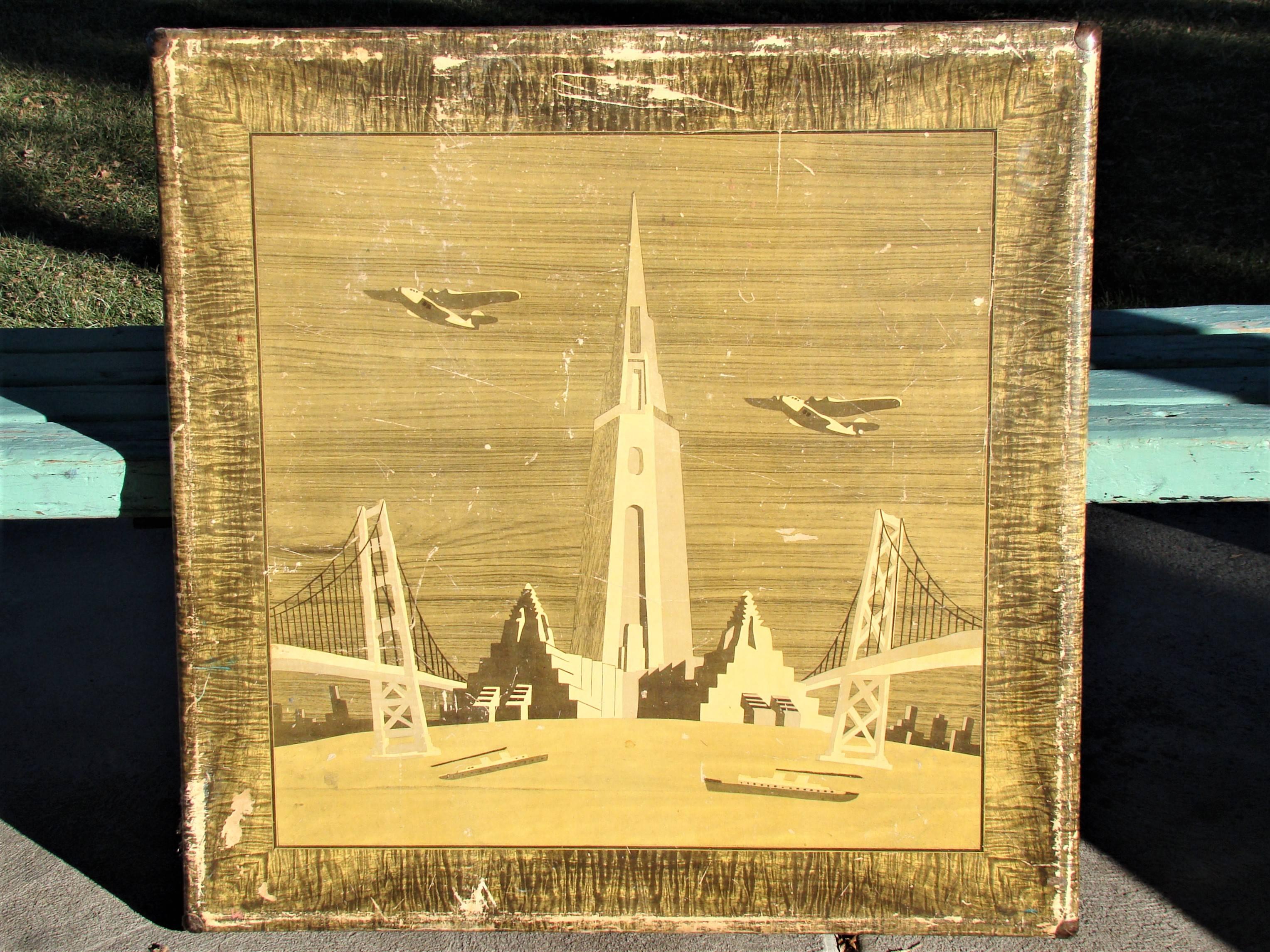 Art Deco card table featuring futuristic buildings, bridges, and planes from the 1939 San Francisco worlds fair. This was the Golden Gate International exposition celebrating among other things the city’s two newly built bridges. The Oakland Bay