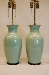 Pair of Early 20th Century Pale Celadon Chinese Urns Wired as Lamps