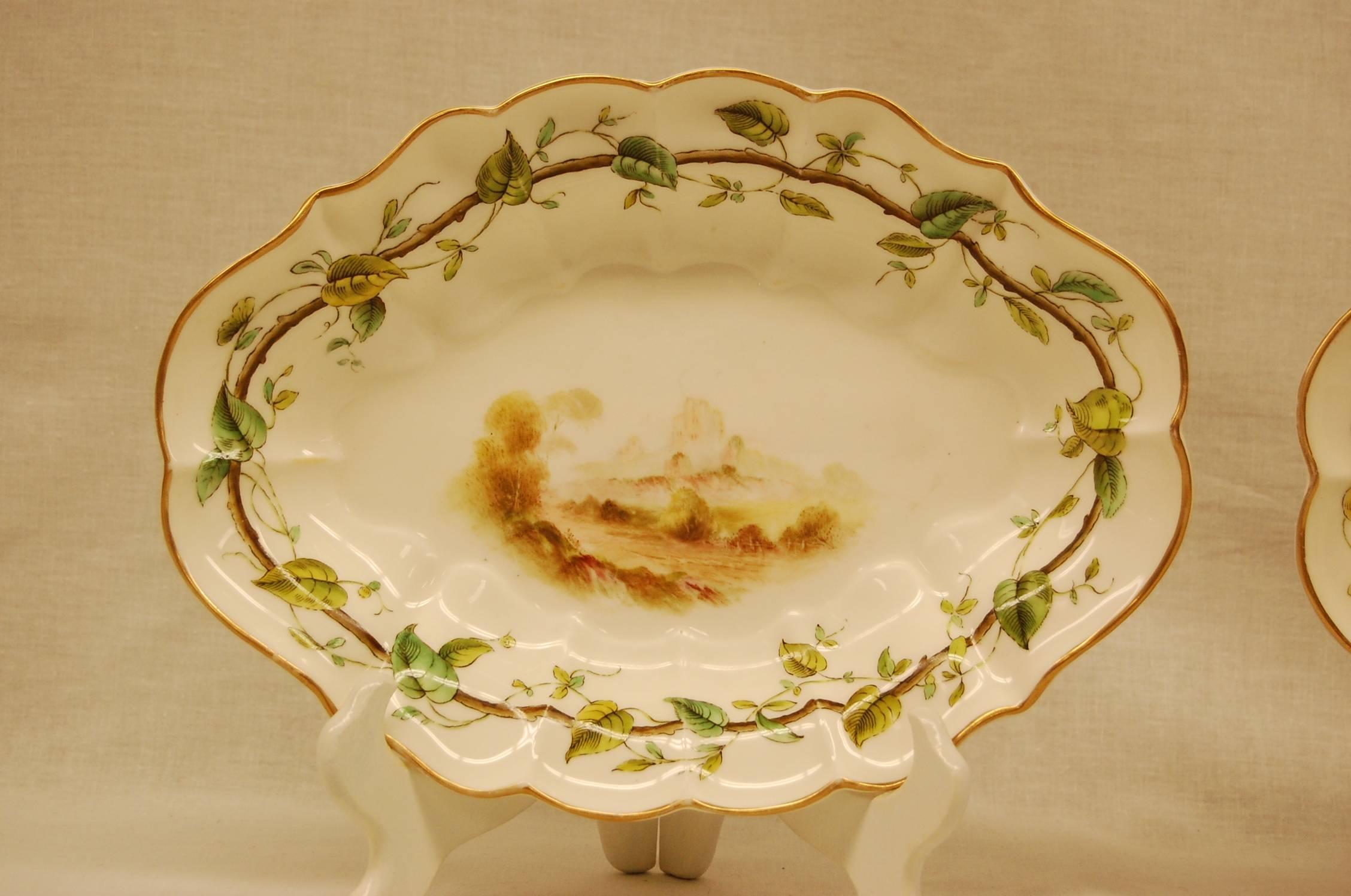 Pair of Royal Worcester oval dessert bowls dating to 1909. Hand-painted scenes of European castles. Very good overall  condition.