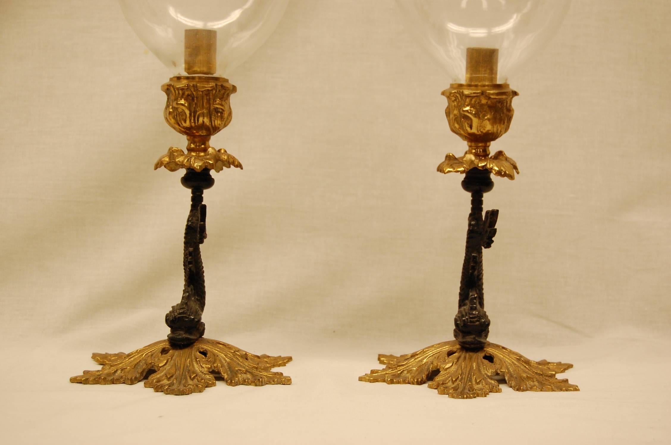 Empire Revival Pair of Reproduction Brass Candlesticks with Glass Hurricanes on Dolphin Bases