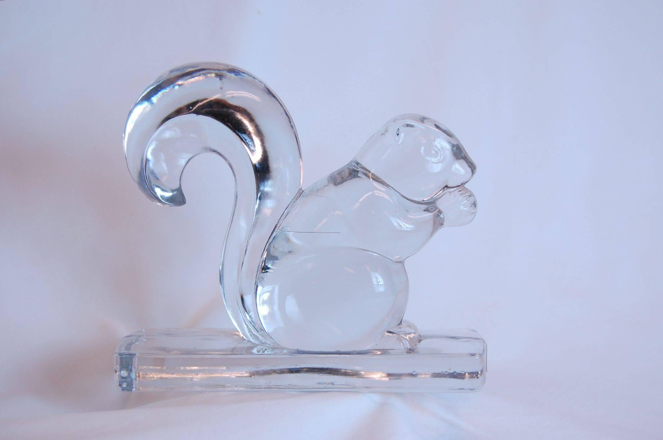 Pair of clear glass squirrels in mint condition.
