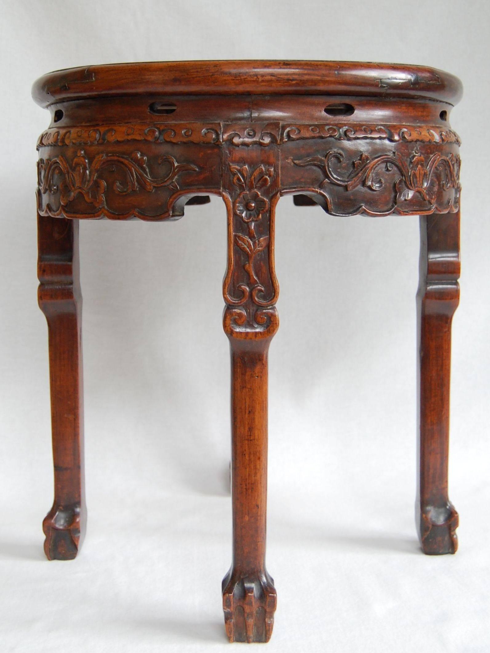 Late 19th century circular Chinese table with marble top. Excellent condition with beautiful color and patina.