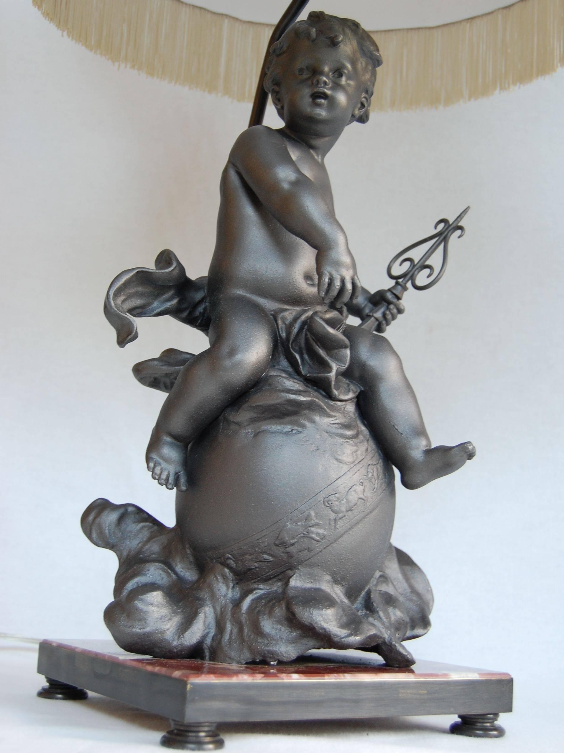 High Victorian Lead Cherub Figure Wired as a Lamp on a Marble Base For Sale