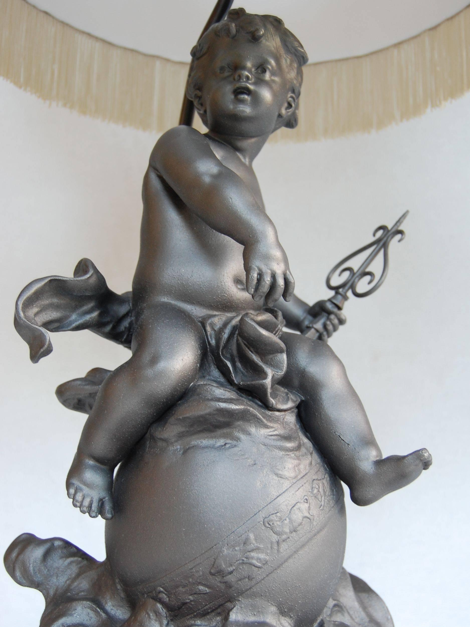 Lead Cherub Figure Wired as a Lamp on a Marble Base In Excellent Condition For Sale In Pittsburgh, PA