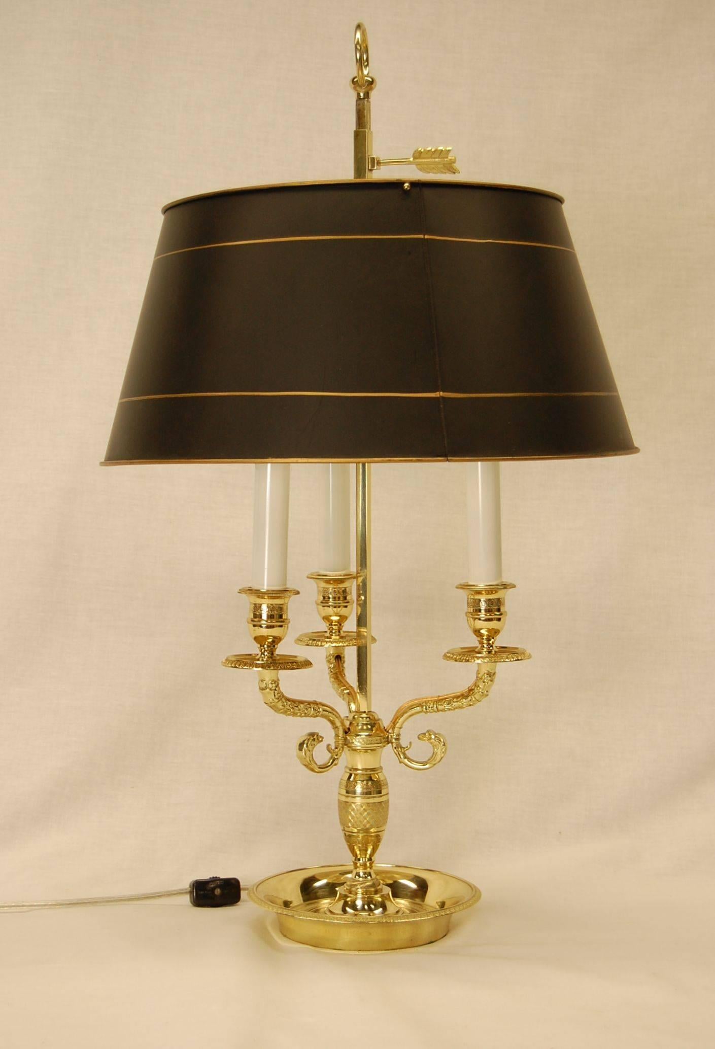 Reproduction solid brass Bouillotte lamp with satin black painted metal shade, just polished, lacquered and rewired. Beautifully etched brass makes this an unusually fine looking lamp.
