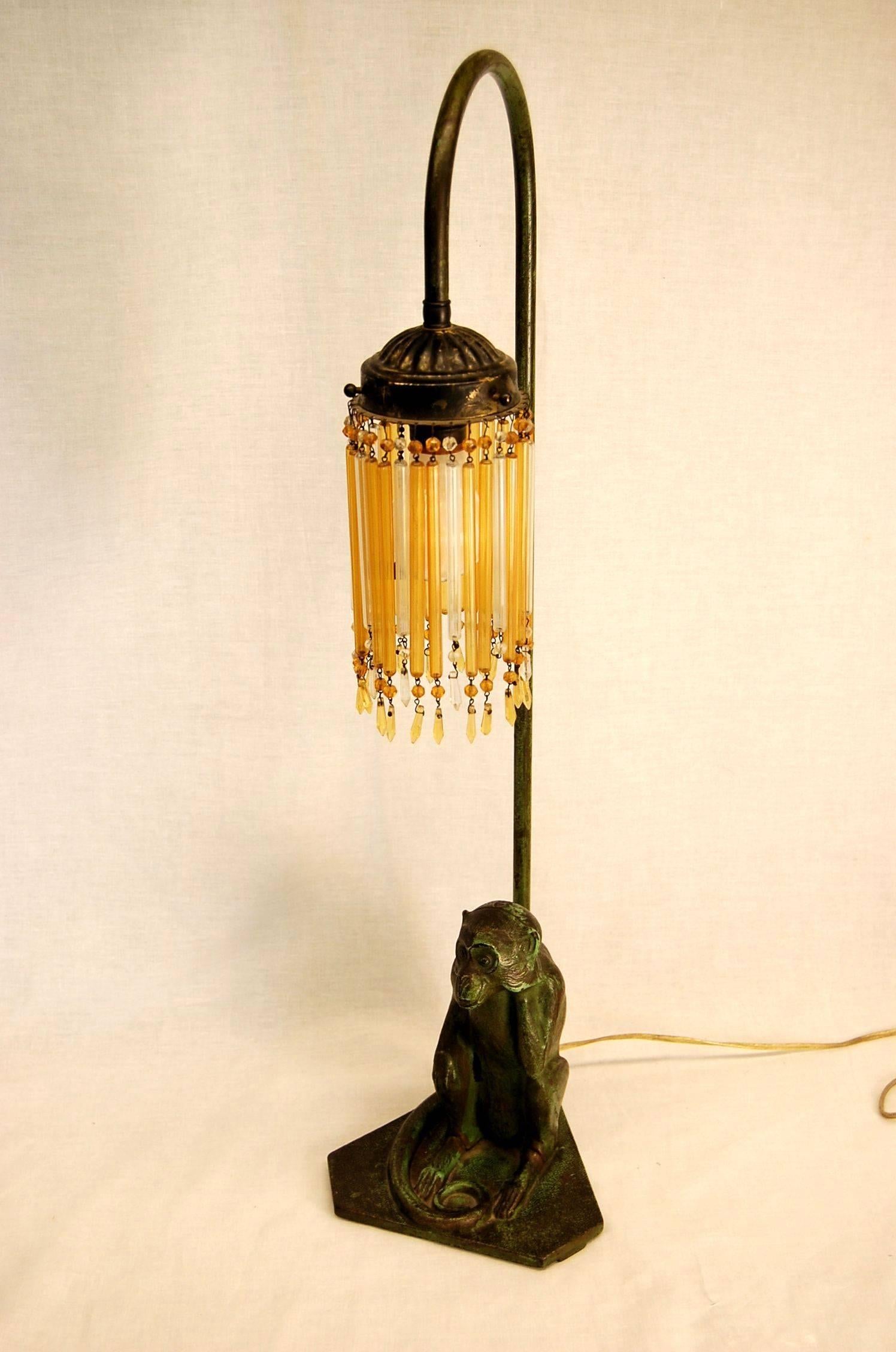 Cast Late 19th Century Steel Figure of Monkey Table Lamp Base with Amber Glass Drops