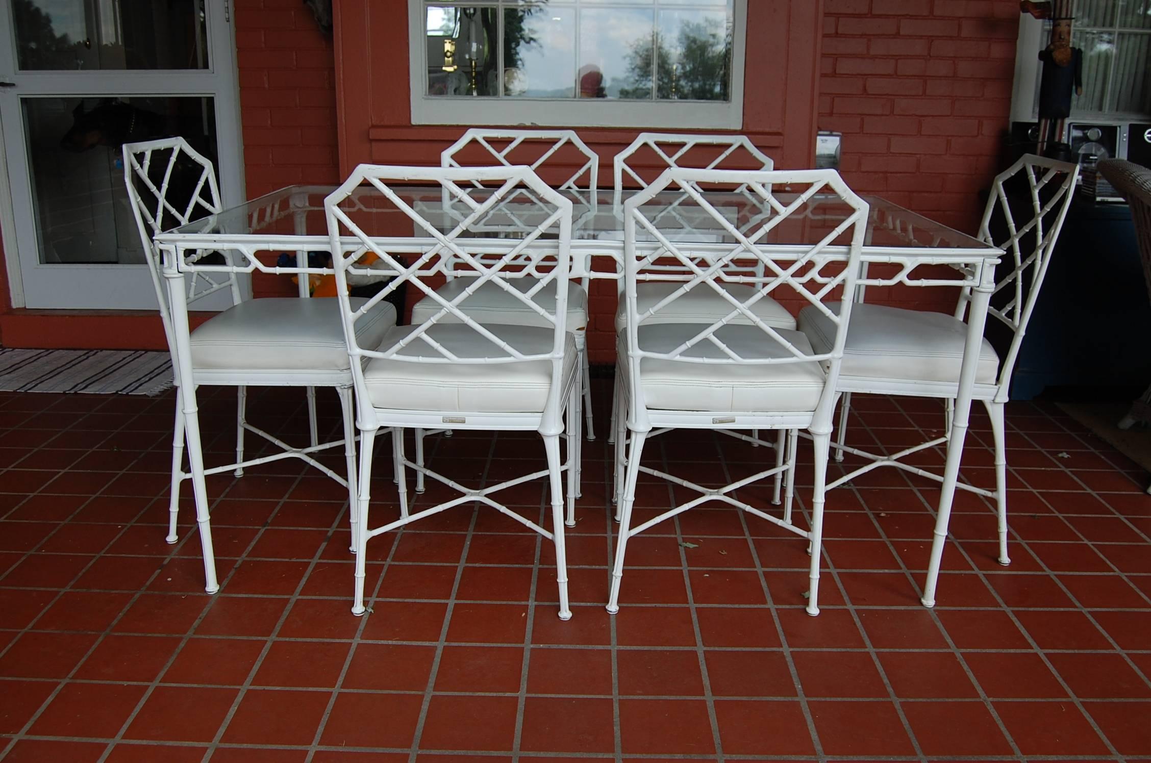 Brown Jordan Calcutta aluminum rectangular table with six side chairs measuring 35 inches x 61 inches long. Very nice set in a rather hard find rectangular size. Everything is tight and stable, good overall condition with some paint loss as shown. 