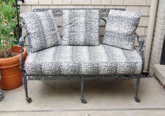 Settee with Cast Iron Scroll Work and Wire Mesh Back in Regency Style
