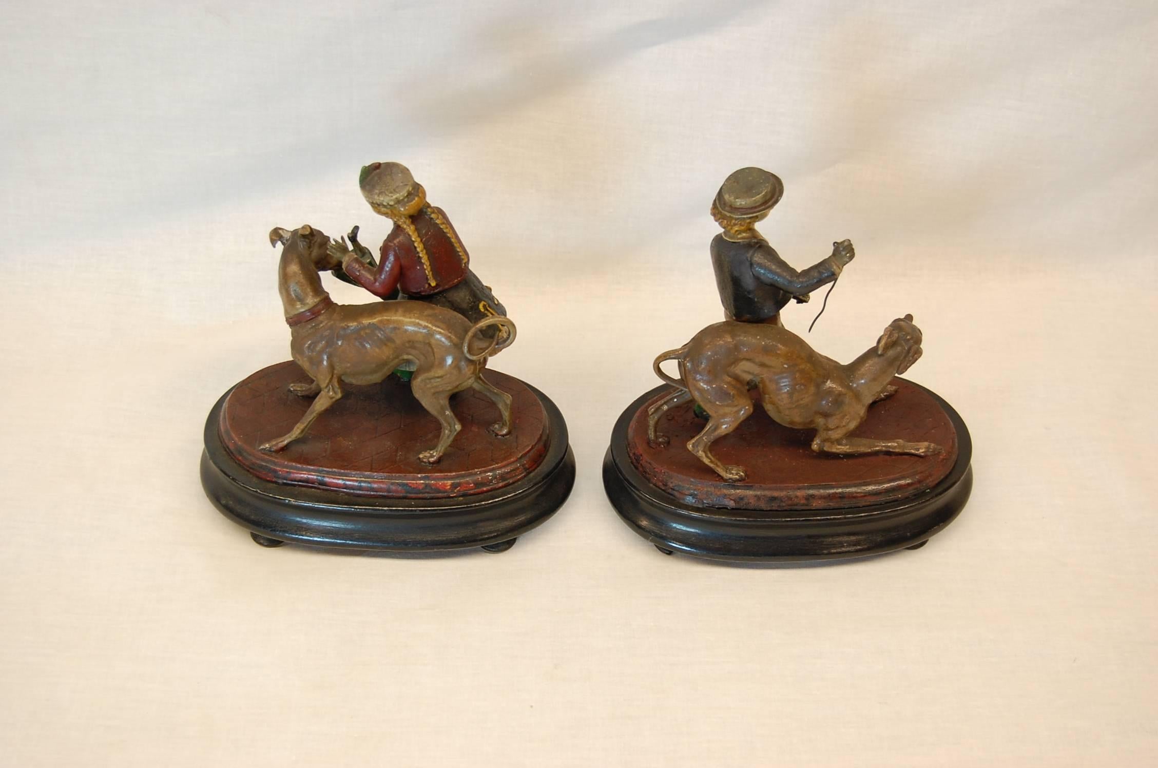 Late 19th Century Pair of Metal Figurines Featuring Children and Their Dogs, circa 1890 For Sale