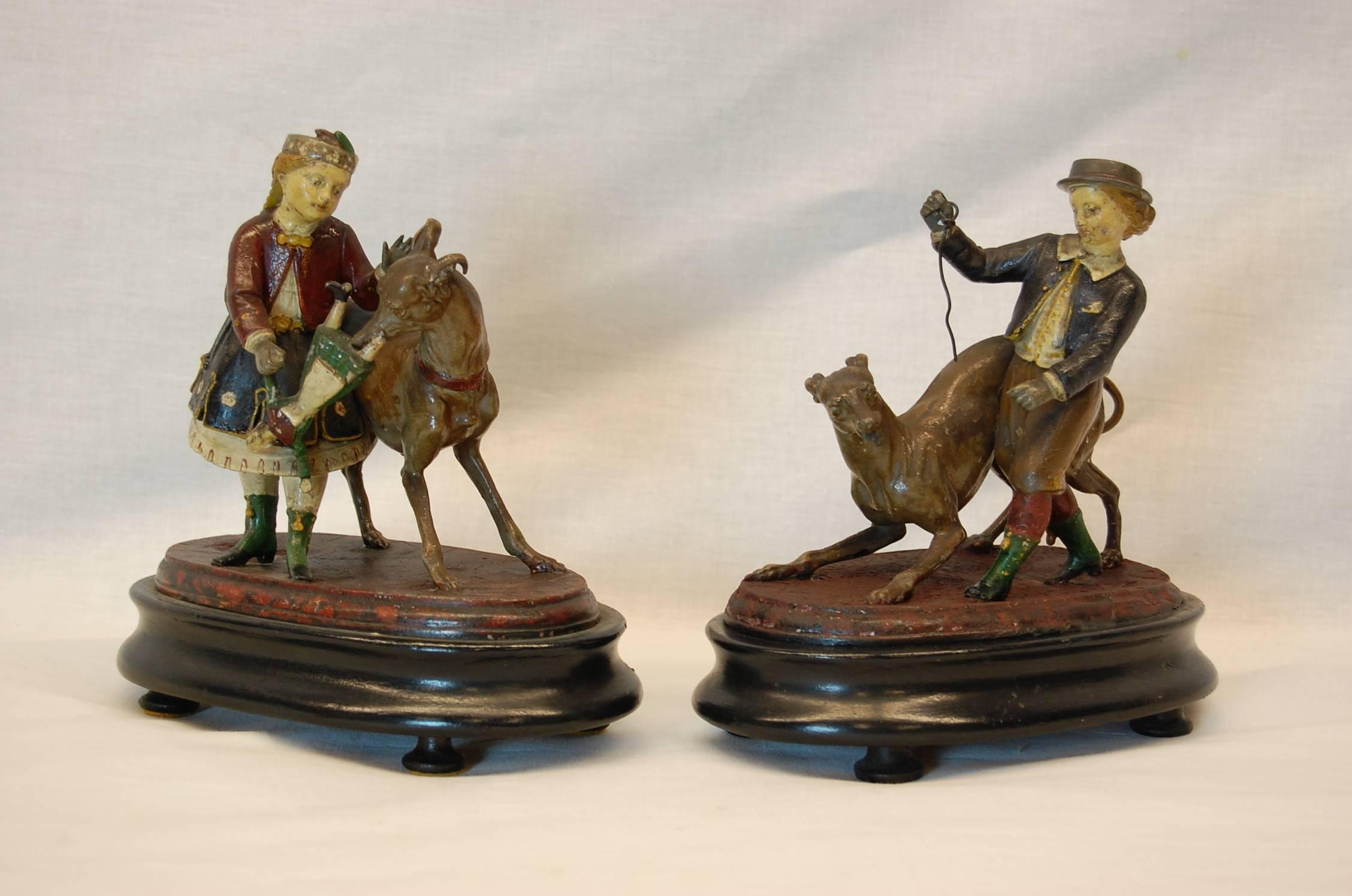 High Victorian Pair of Metal Figurines Featuring Children and Their Dogs, circa 1890 For Sale