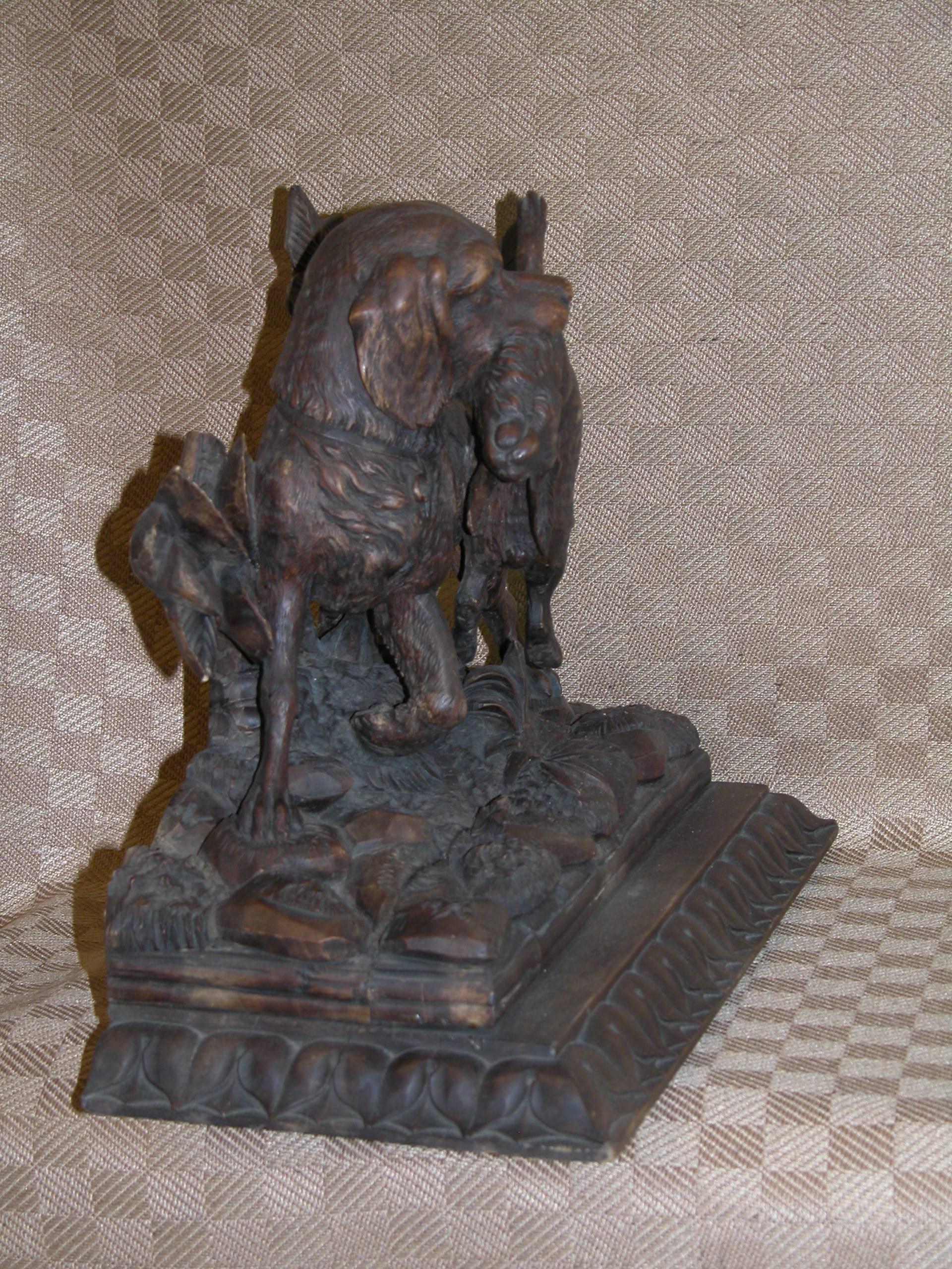 19th Century Black Forest Carving of Hunting Dog with Rabbit on Fancy Carved Base, circa 1850