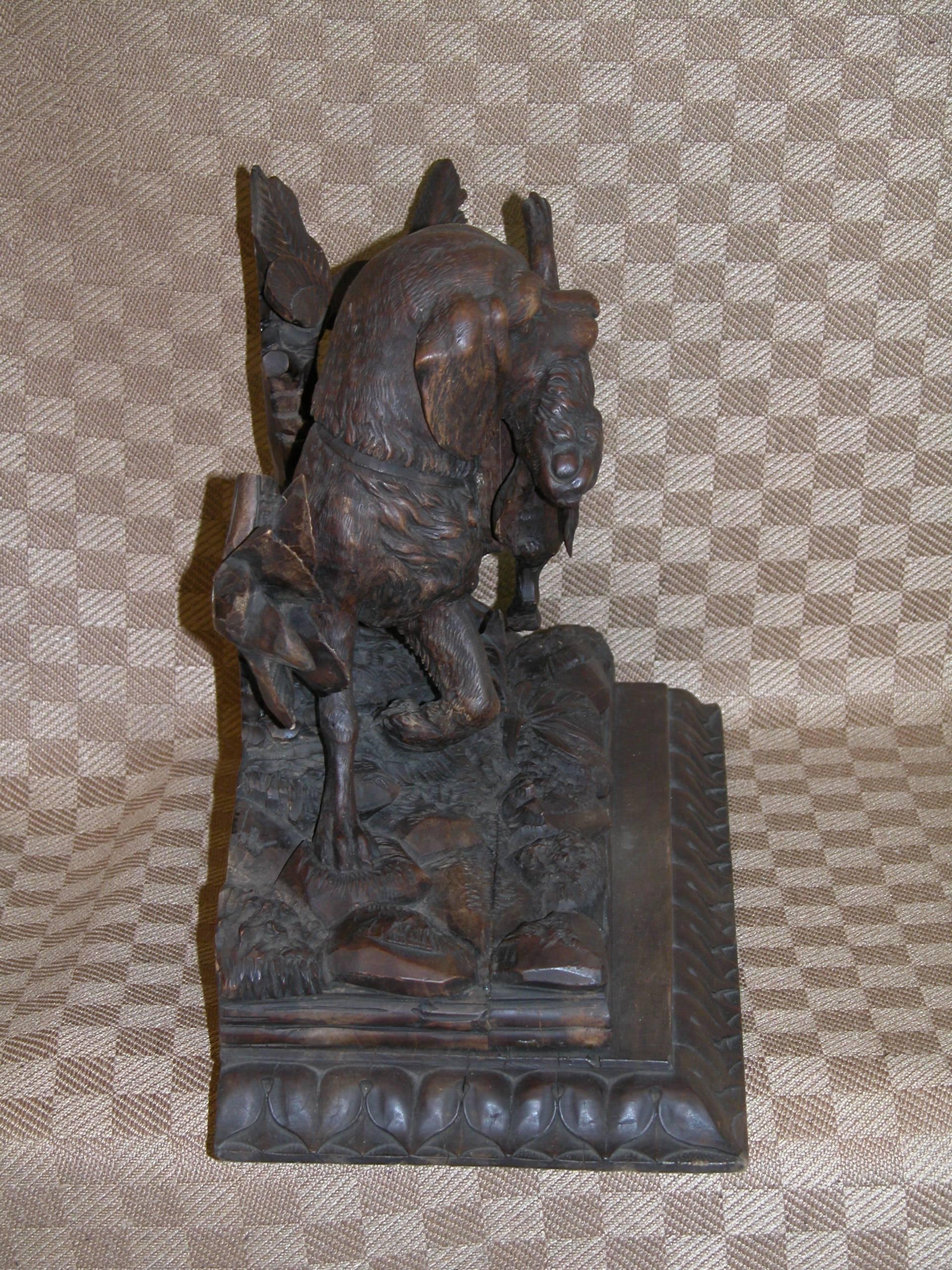Wood Black Forest Carving of Hunting Dog with Rabbit on Fancy Carved Base, circa 1850