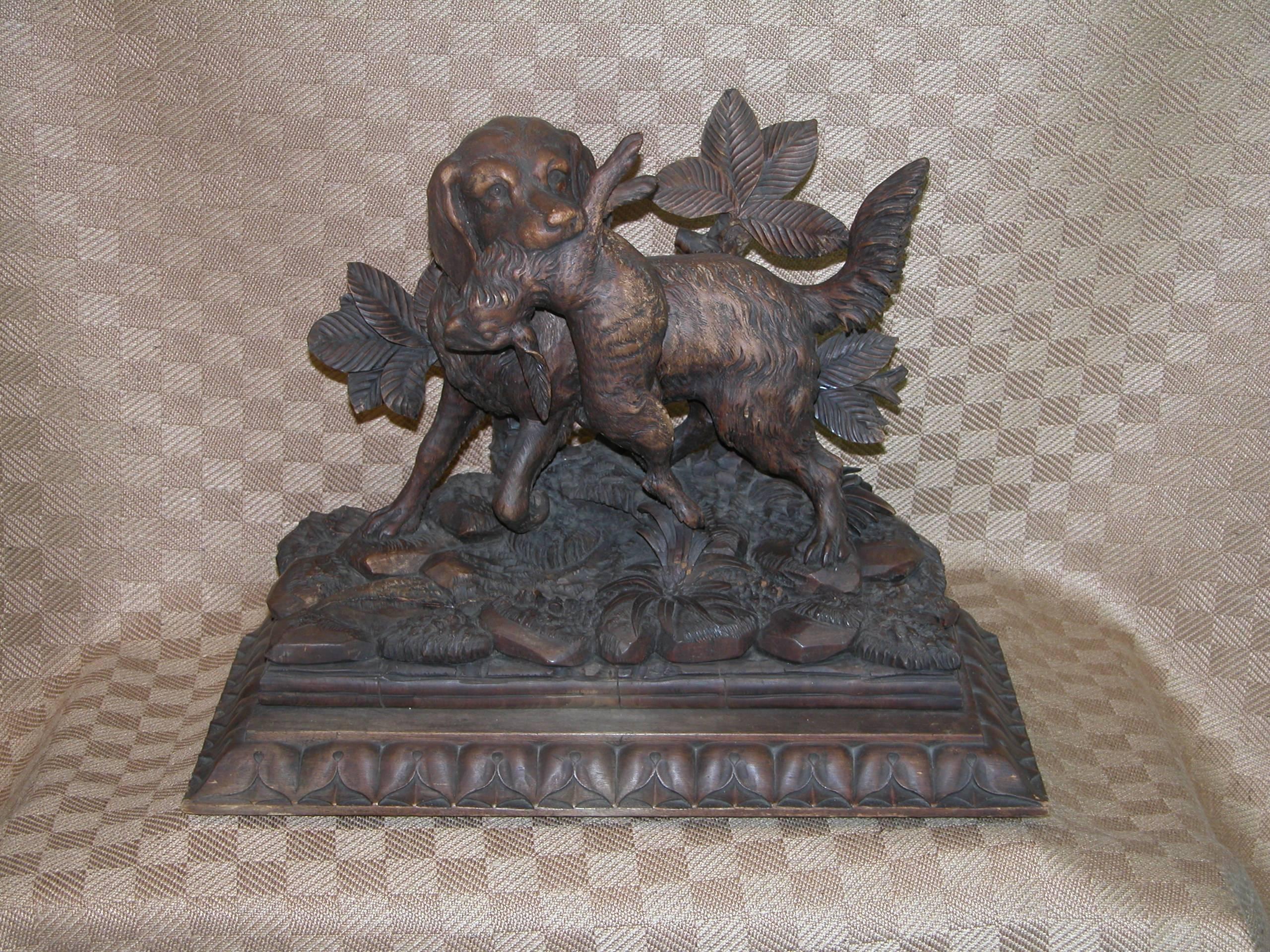 German Black Forest Carving of Hunting Dog with Rabbit on Fancy Carved Base, circa 1850