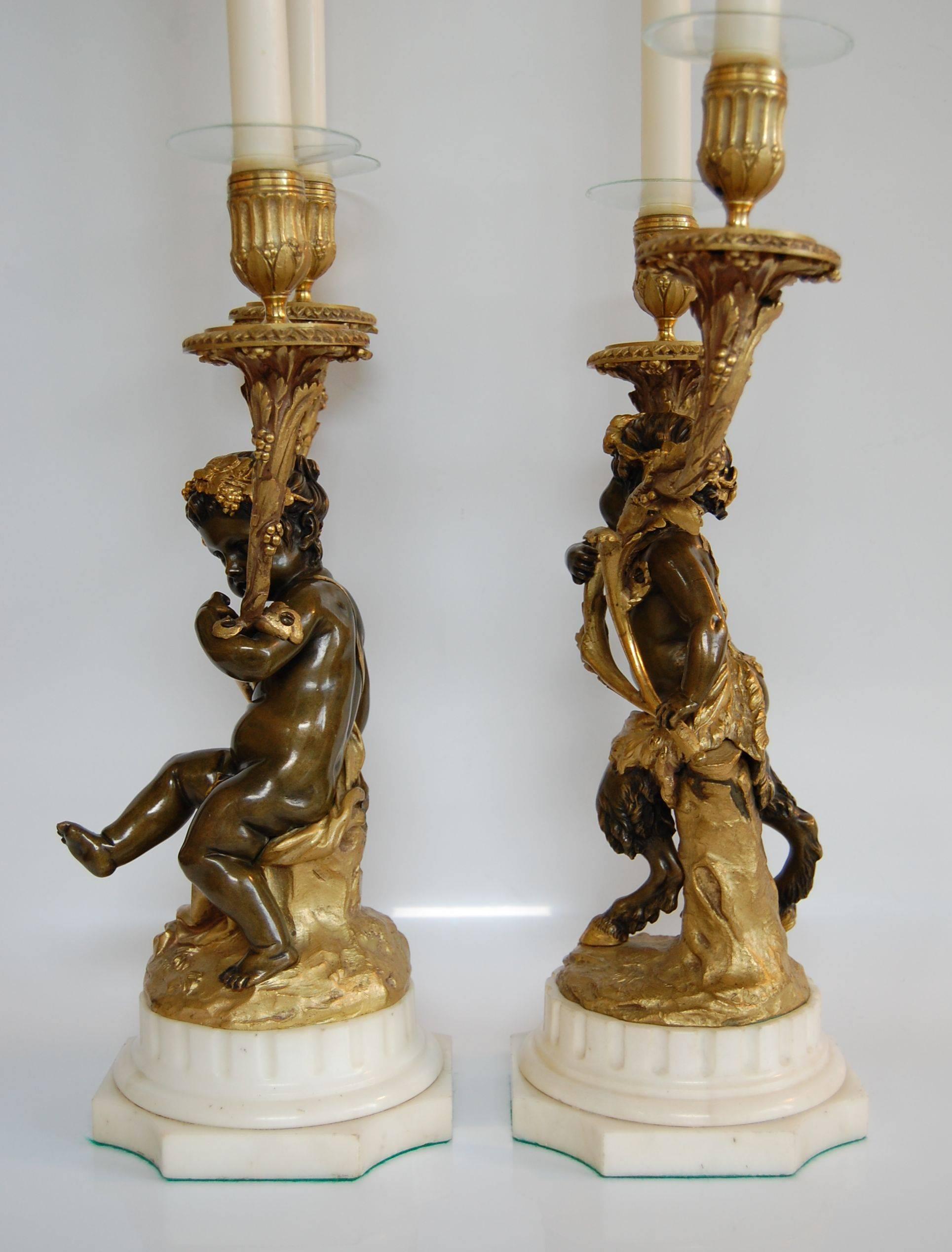 Hand-Carved Pair of Gilt and Patinated Two-Light Candelabra, Signed 