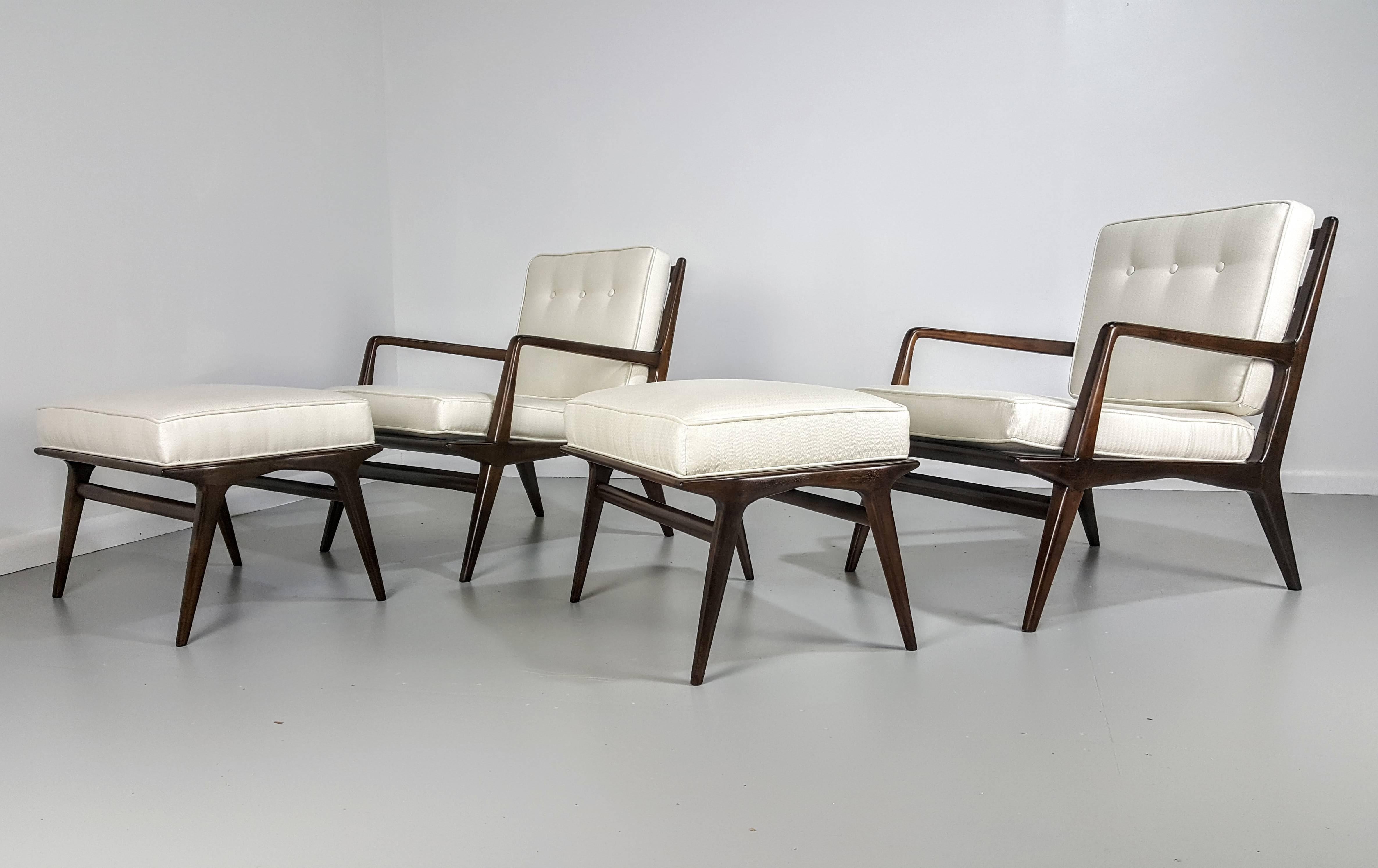 Pair of Carlo di Carli lounge chairs with Ottomans for Singer and Sons, Italy, 1950s. Fully restored and newly upholstered.

See this item in our private NYC showroom! Refine Limited is located in the heart of Chelsea at the history