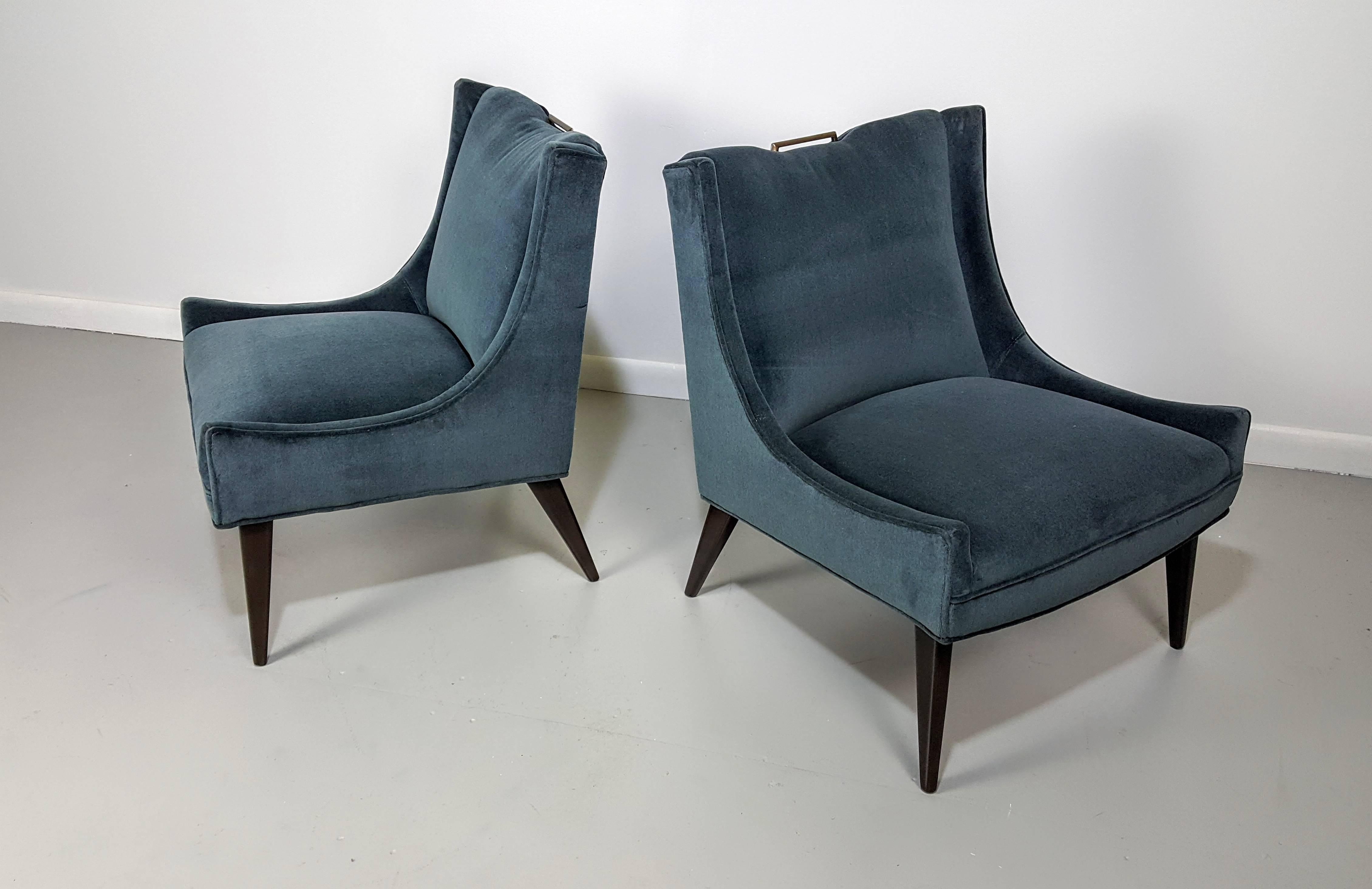 Pair of Mohair slipper chairs in the manner of Harvey Probber, 1950s. Dark walnut legs with patinated brass detail. Gorgeous scale and quality.
We offer free regular deliveries to NYC and Philadelphia area. Delivery to DC, MD, CT and MA are