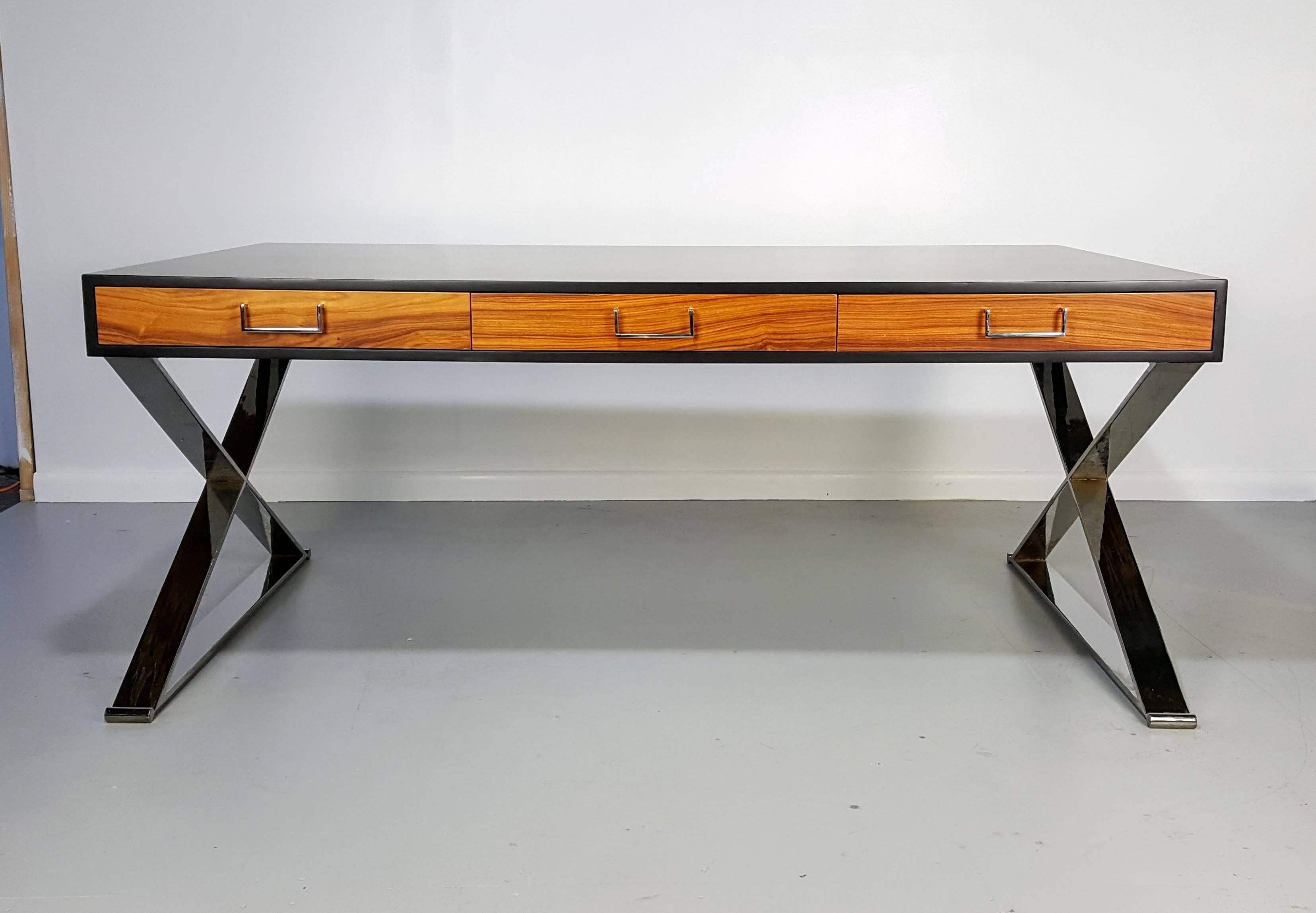 Massive executive desk in lacquer, rosewood and chrome by Milo Baughman, 1970s.

We offer free regular deliveries to NYC and Philadelphia area. Delivery to DC, MD, CT and MA are available if schedule permits, please message for a location-based