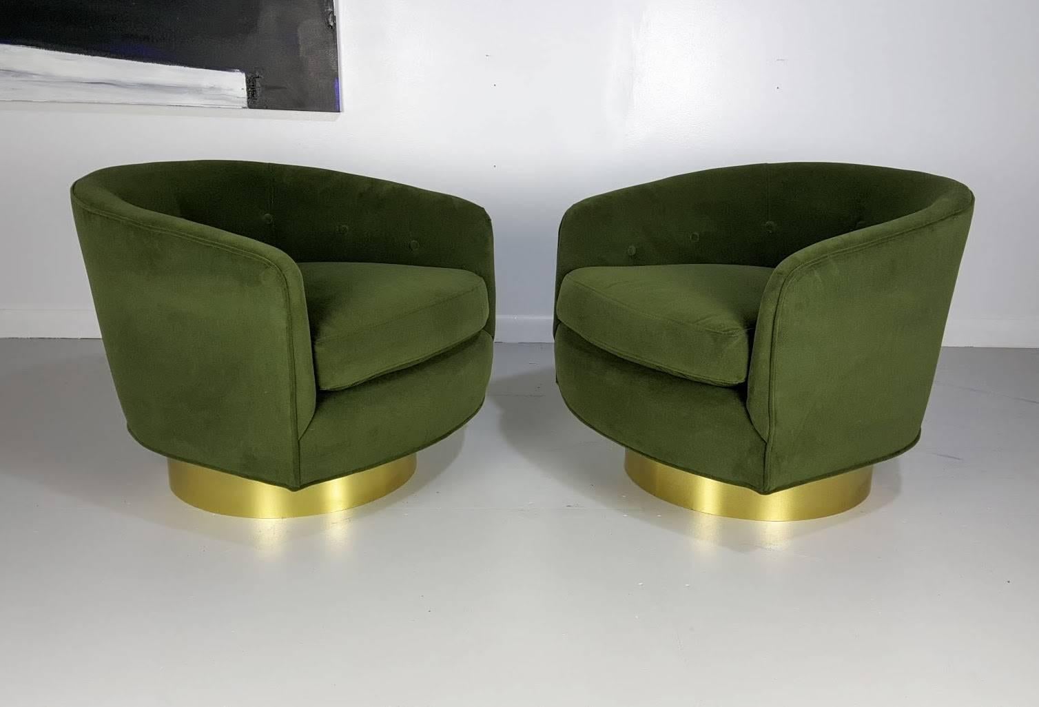 Gorgeous tub chairs in velvet with polished brass bases in the style of Milo Baughman. These chairs are designed and manufactured by Refine Limited. Very comfortable and have swivel mechanism. Materials and quality are exceptional. Upholstered in a