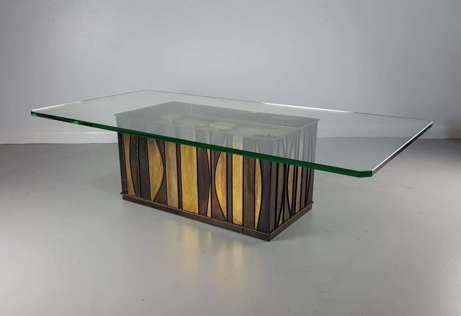 Brutalist sculptural brass coffee table by Curtis Jere, 1970s. Fantastic table base with contrasting polished and patinated brass sections. 

Base dimensions: 30.75