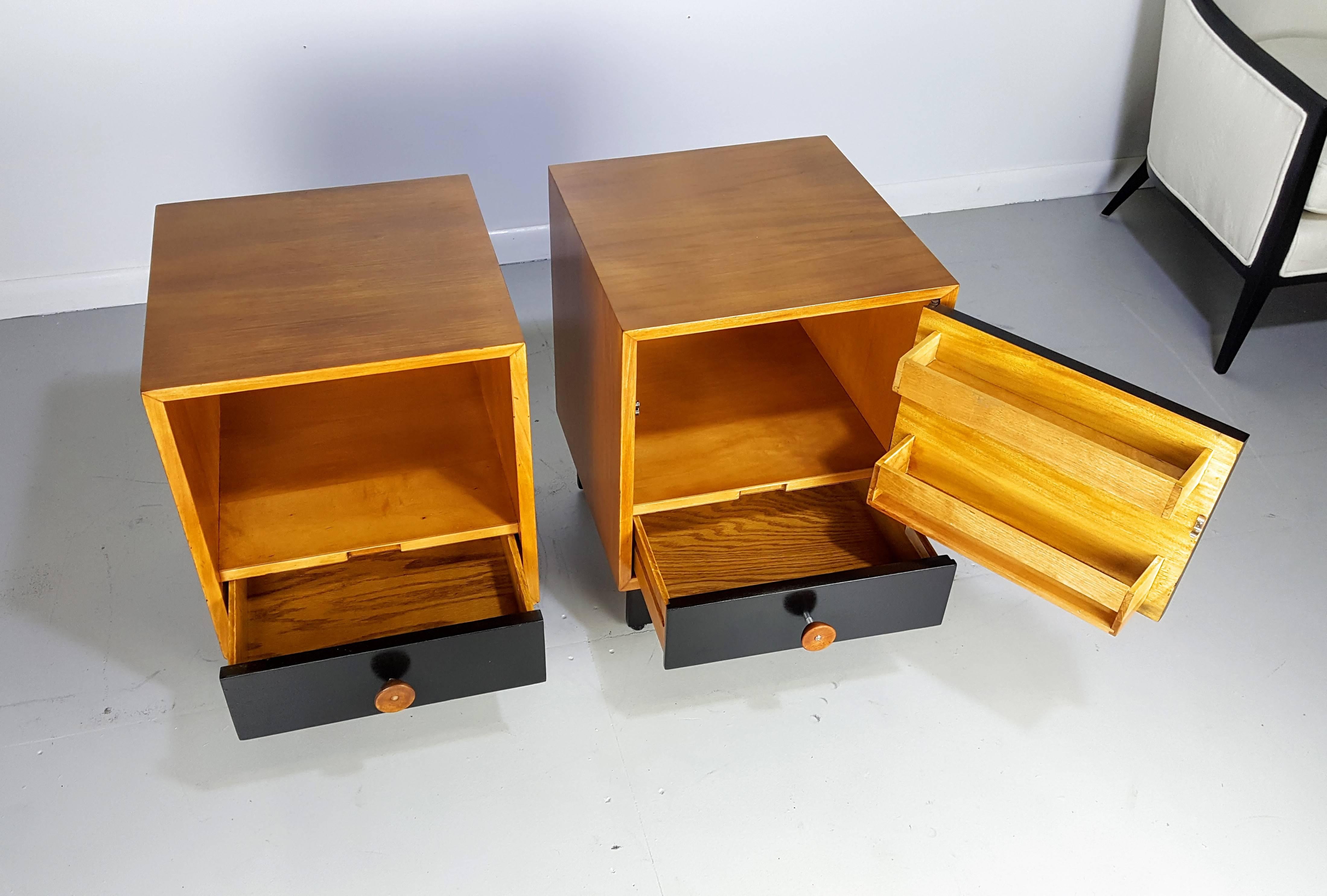 Classic Midcentury nightstands with cupcake pulls by George Nelson for Herman Miller, 1950s. Fully restored and in gorgeous condition.

See this item in our private NYC showroom! Refine Limited is located in the heart of Chelsea at the history