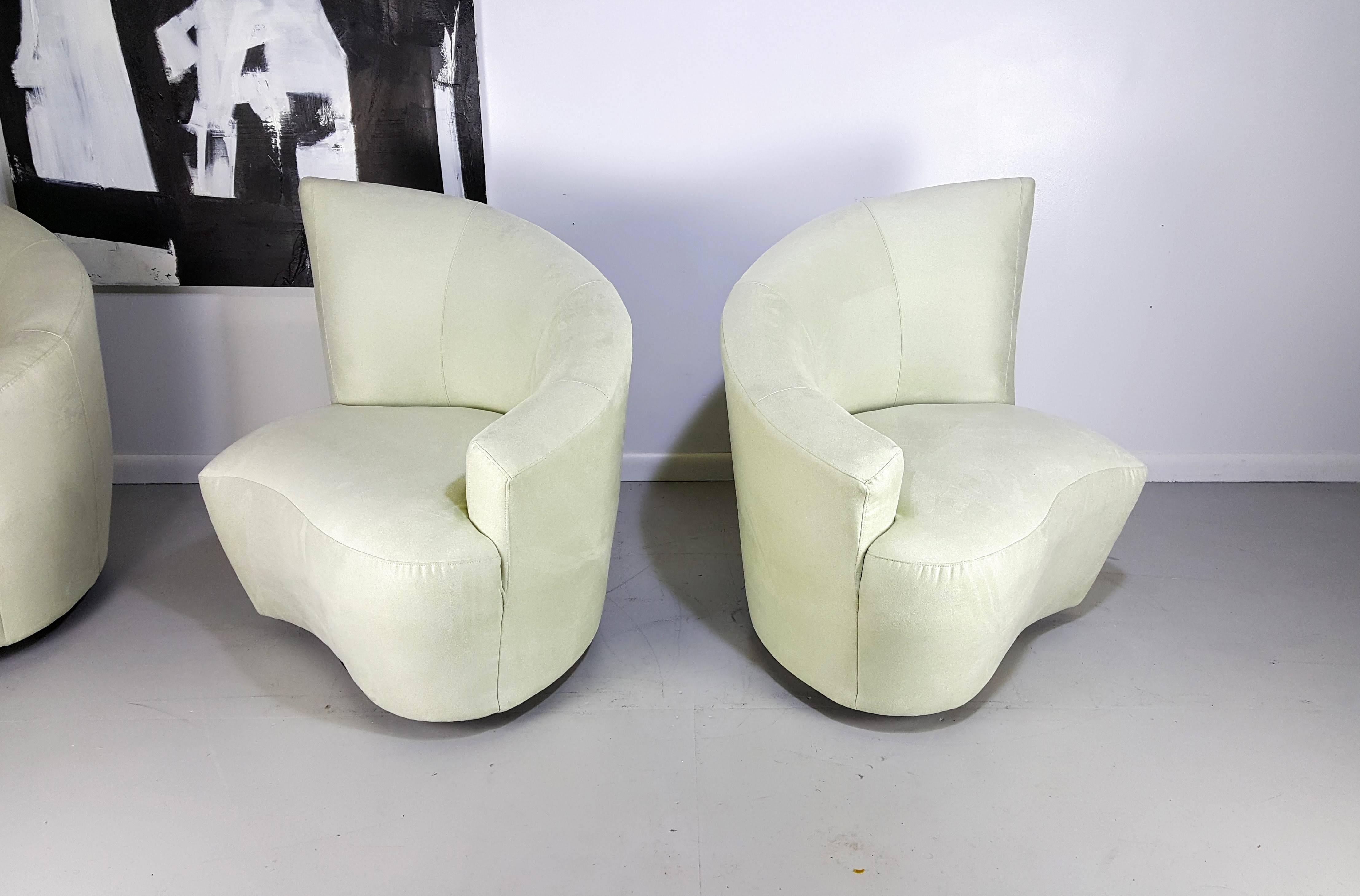 Sculptural Bilbao lounge chairs by Vladimir Kagan in ultra-suede, 1970s. Newly reupholstered. Color reads as a neutral cream with a pale green cast.

See this item in our private NYC showroom! Refine Limited is located in the heart of Chelsea at the