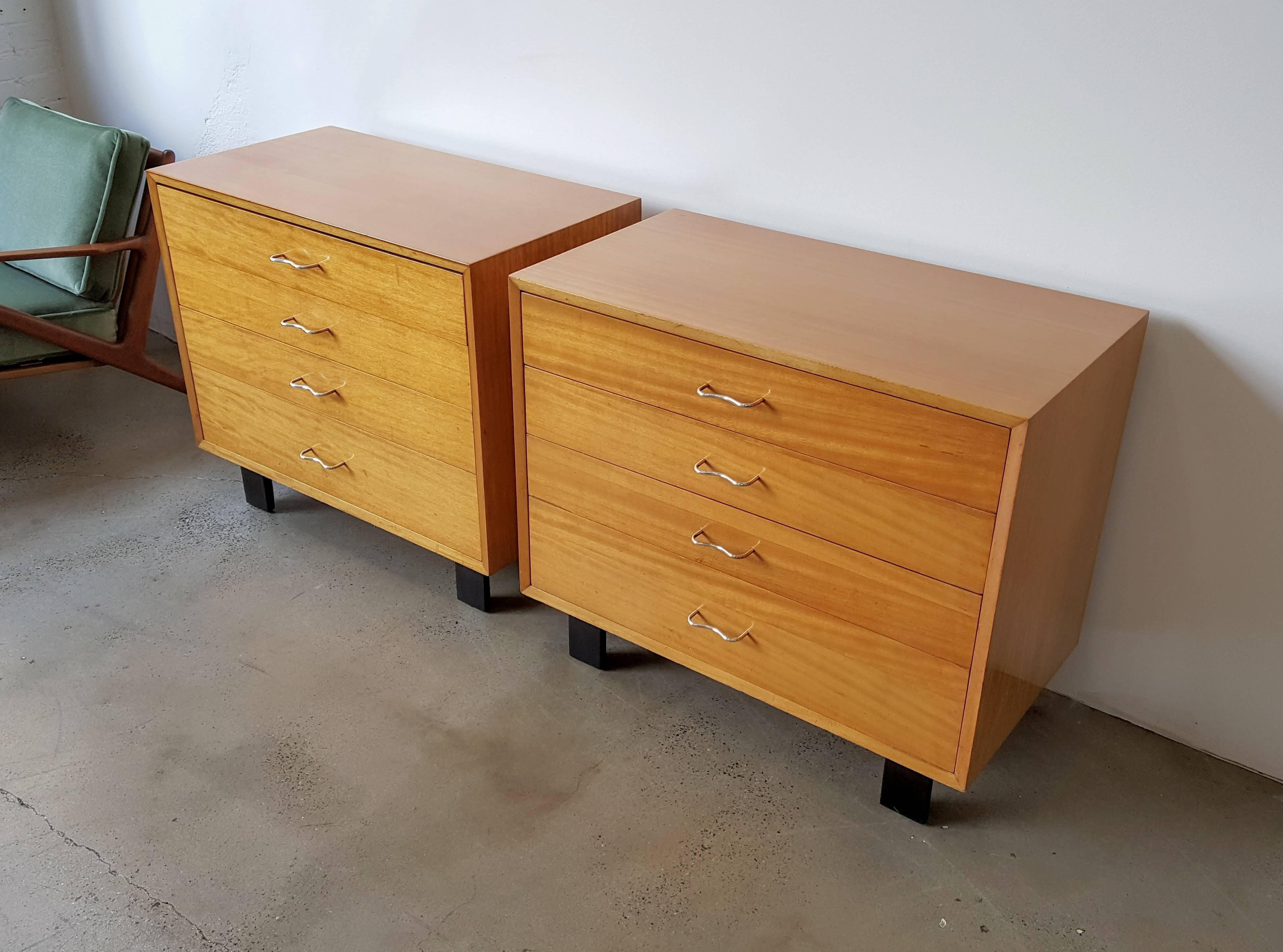 Pair of modern mahogany chests by George Nelson for Herman Miller, 1950s. Simple, elegant, and classic. The light mahogany finish with metal and ebonized accents was very popular in the "California Modern" movement of 1950s and used by