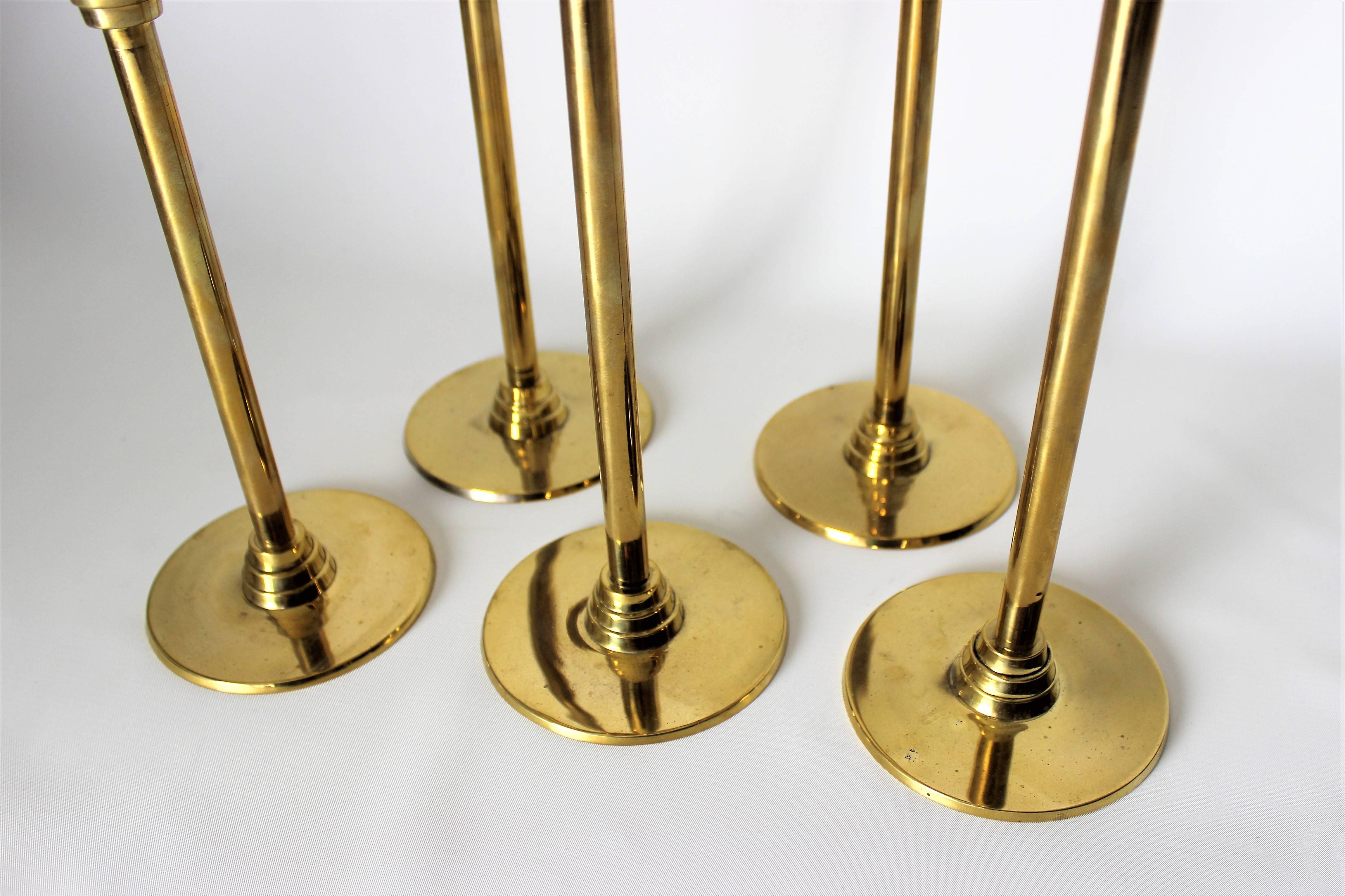 Commanding 1970s Art Deco Revival Brass Candleholders in Graduated Heights In Excellent Condition In New York, NY