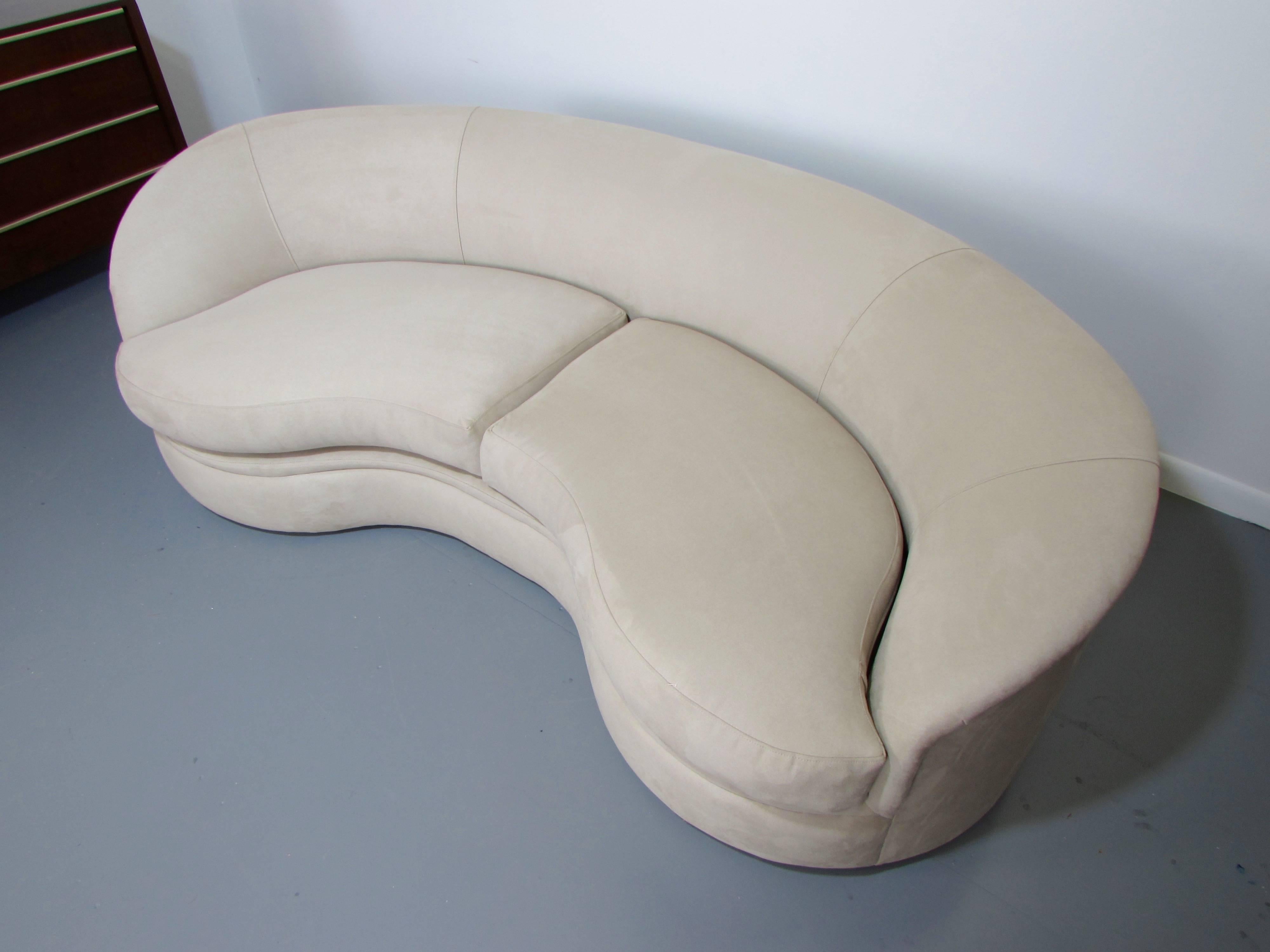 Biomorphic kidney bean shaped sofa by Vladimir Kagan for Directional, 1970s. This piece has been fully restored in an ultra-suede much like the original upholstery.

We offer free regular deliveries to NYC and Philadelphia area. Delivery to DC,