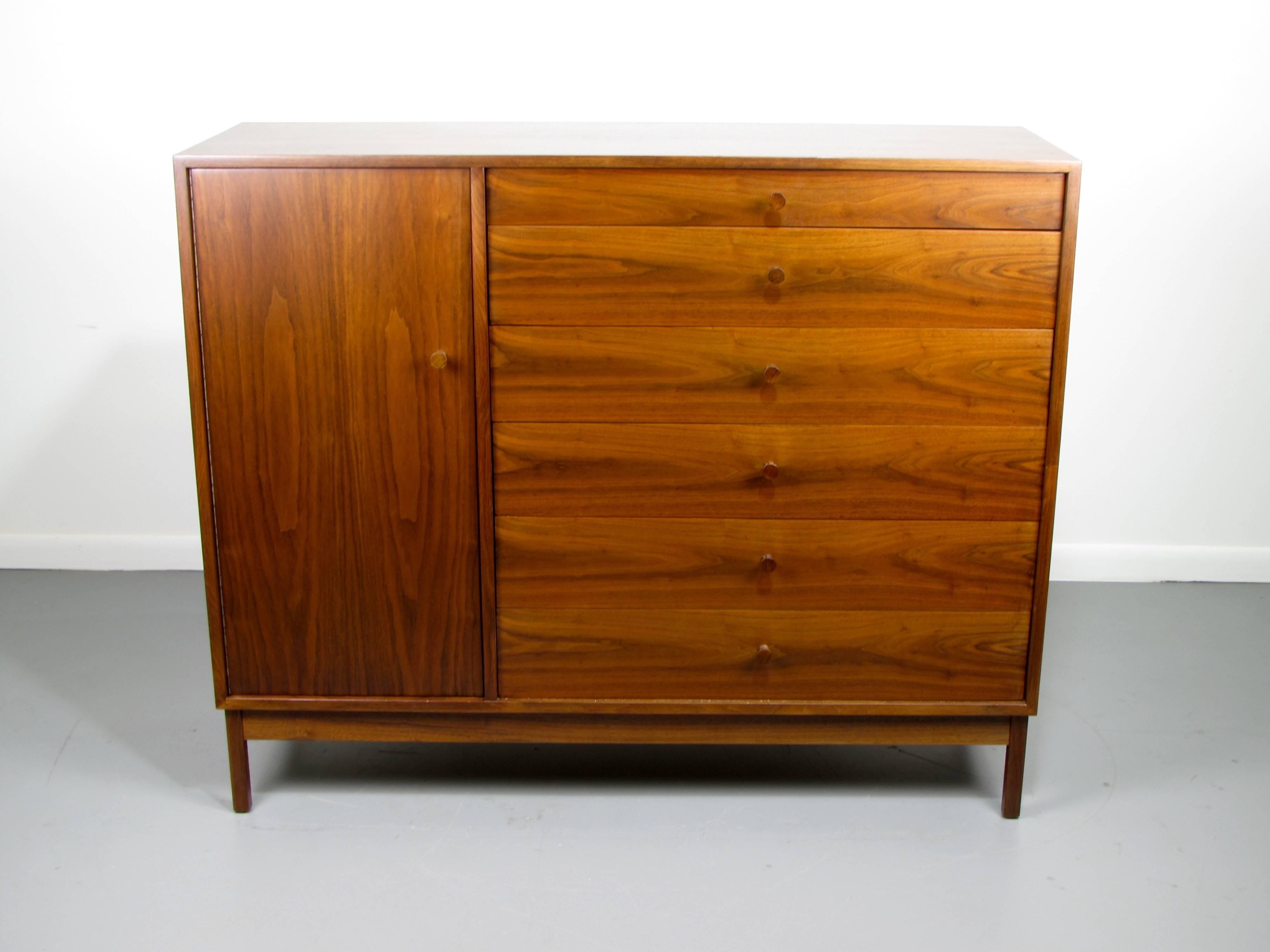 Tall walnut gentlemen's chest dresser by Kipp Stewart for Drexel, 1950s. Fully restored and in excellent condition. 

We offer free regular deliveries to NYC and Philadelphia area. Delivery to DC, MD, CT and MA are available if schedule permits,