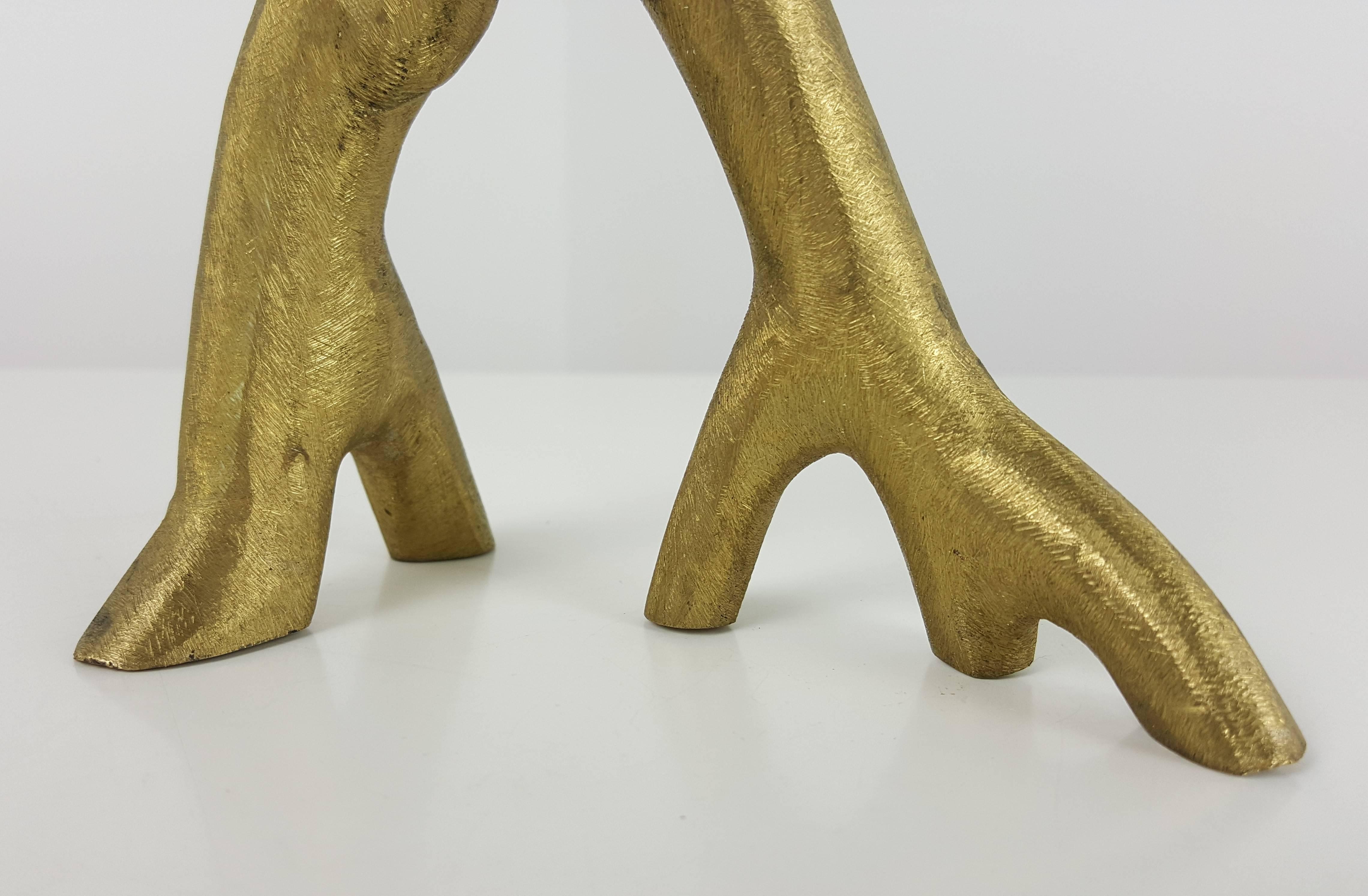 Early hand-forged brass candlestick by Michael Aram, signed 1992. 

We offer free regular deliveries to NYC and Philadelphia area. Delivery to DC, MD, CT and MA are available if schedule permits, please message for a location-based delivery quote.