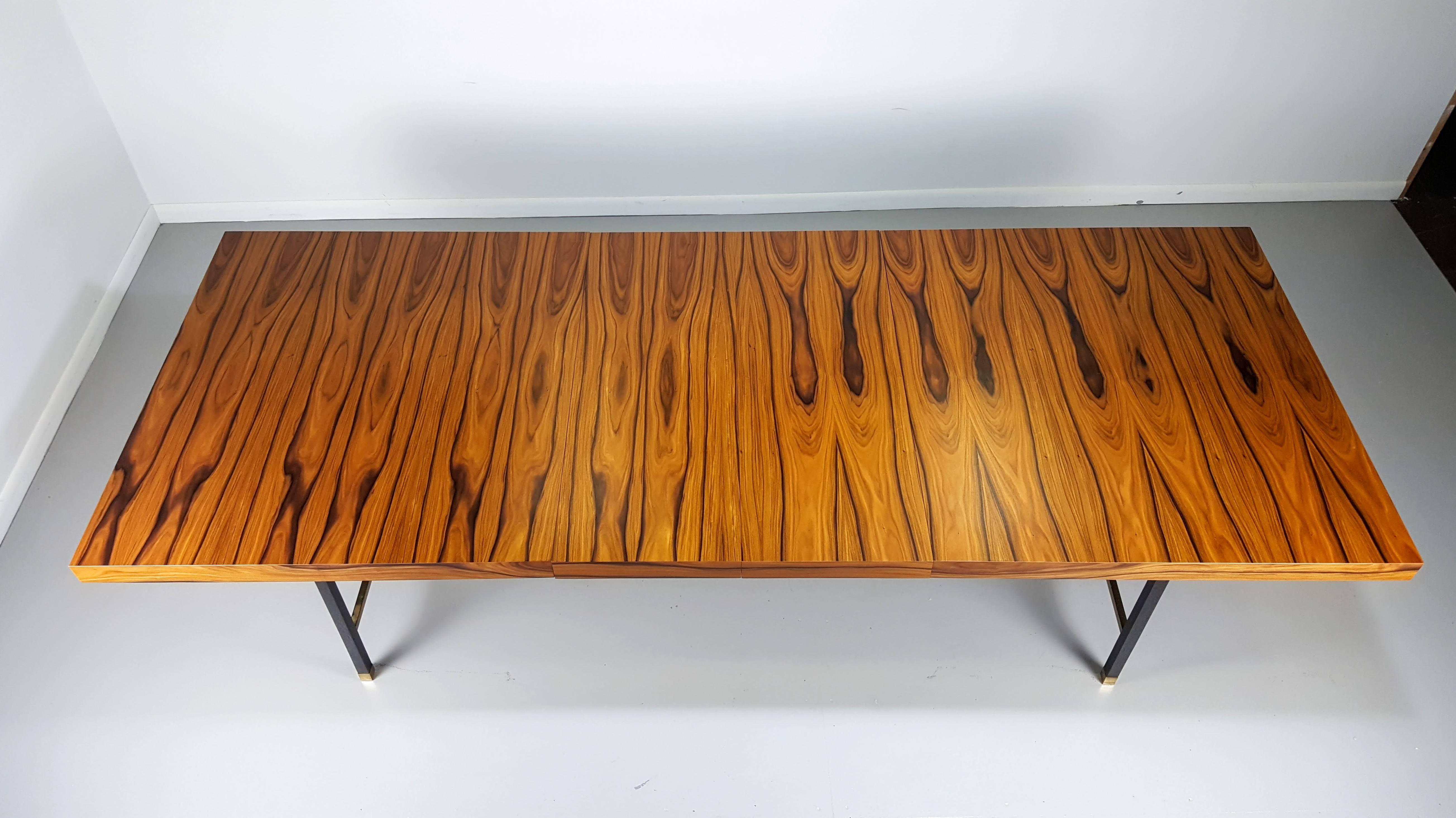 Breathtaking rosewood dining table with brass stretchers by Harvey Probber Studio, 1965. This table is by far the best quality dining table we have had. Original mahogany veneer was replaced with an absolutely insane rosewood grain veneer. Brass is