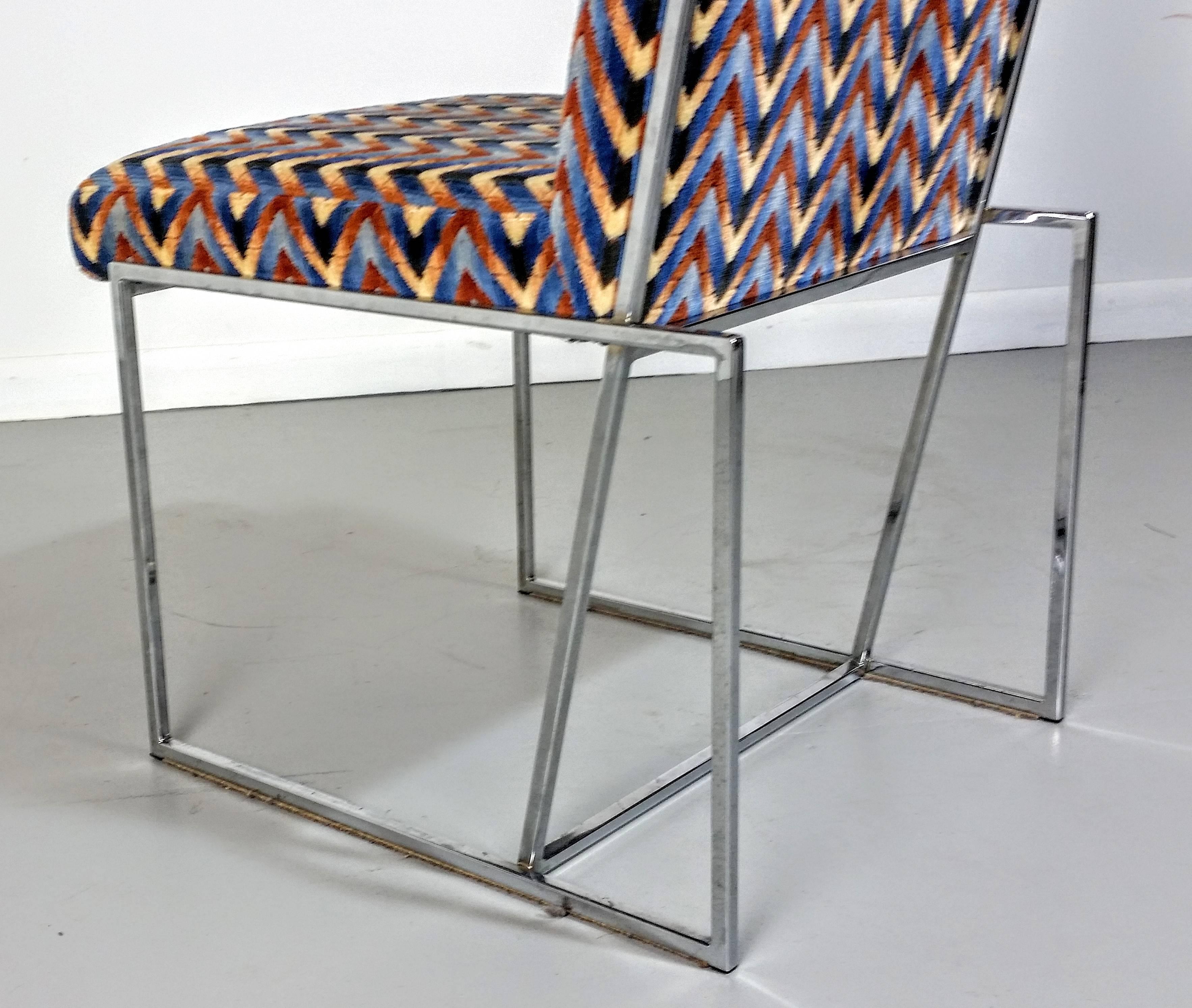 Rare architectural chrome dining chairs in the style of Milo Baughman, 1970s. Excellent vintage condition. Chrome is beautiful. Ready for reupholstery!

See this item in our private NYC showroom! Refine Limited is located in the heart of Chelsea at