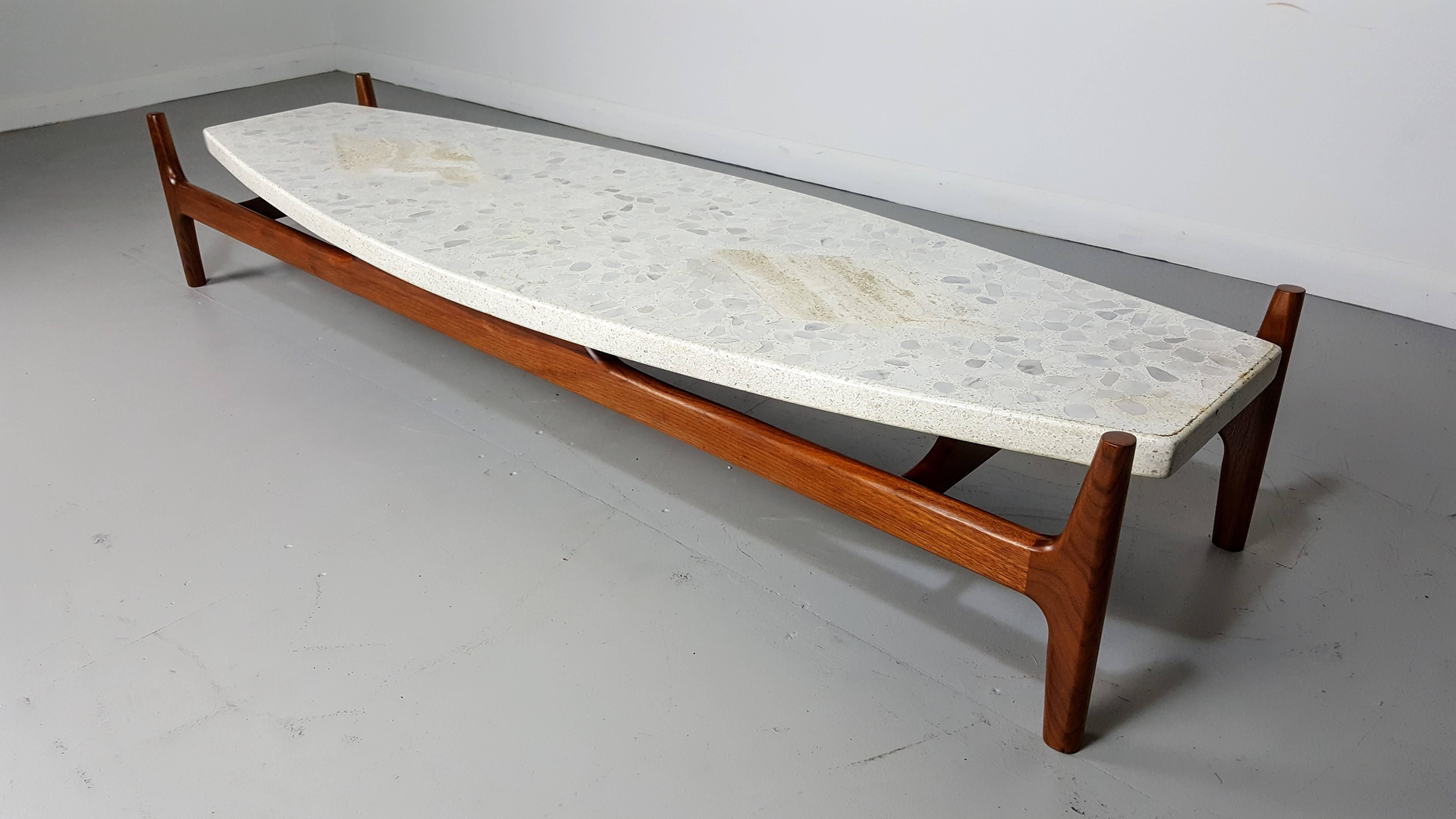 Low sculptural walnut coffee table with inlaid terrazzo top by Harvey Probber, 1960s. This piece has been fully restored.

We offer free regular deliveries to NYC and Philadelphia area. Delivery to DC, MD, CT and MA are available if schedule