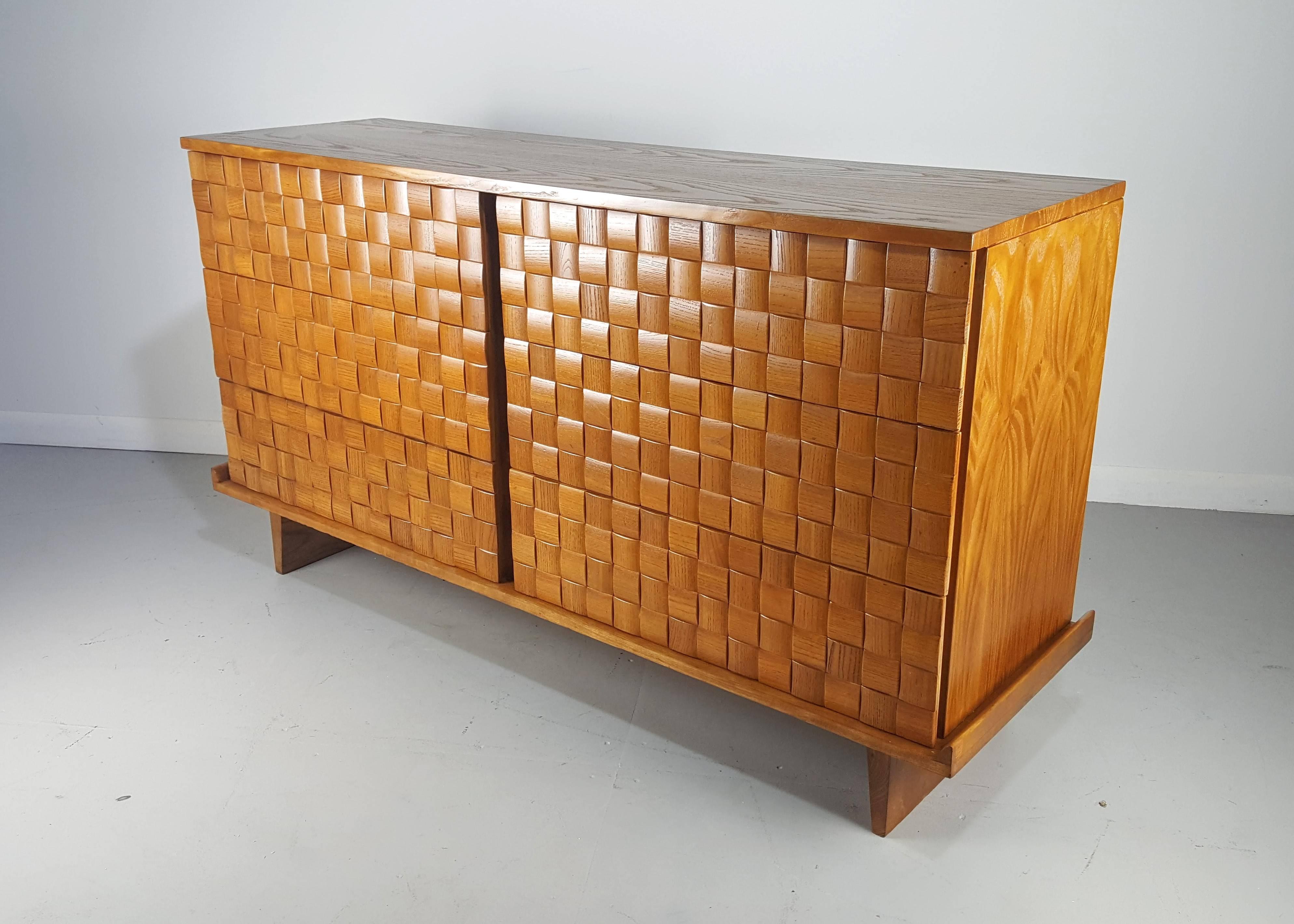 Exquisite and rare six-drawer chest or dresser by Paul Laszlo, 1950s. Solid oak construction with incredible grain throughout. His best design from this line and an absolute showstopper. It has been fully restored and is in excellent condition.