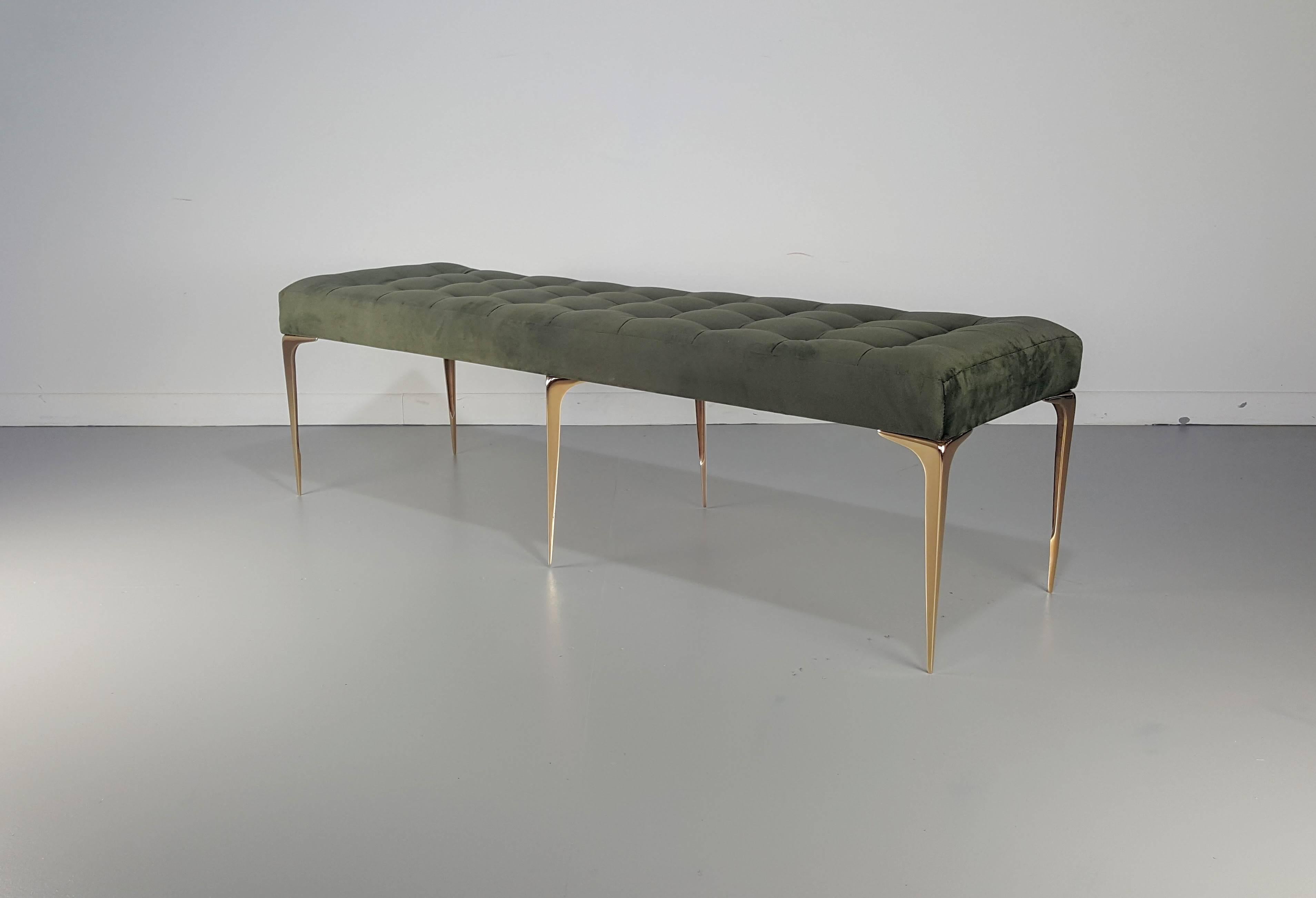 Lancia Espansa bench with a solid bronze tapered legs. The leg is an exact reproduction of a 1950s Italian design. Originally produced in brass, our version is hand cast in solid bronze which has a richer, warmer golden tone. Custom sizes, fabrics,