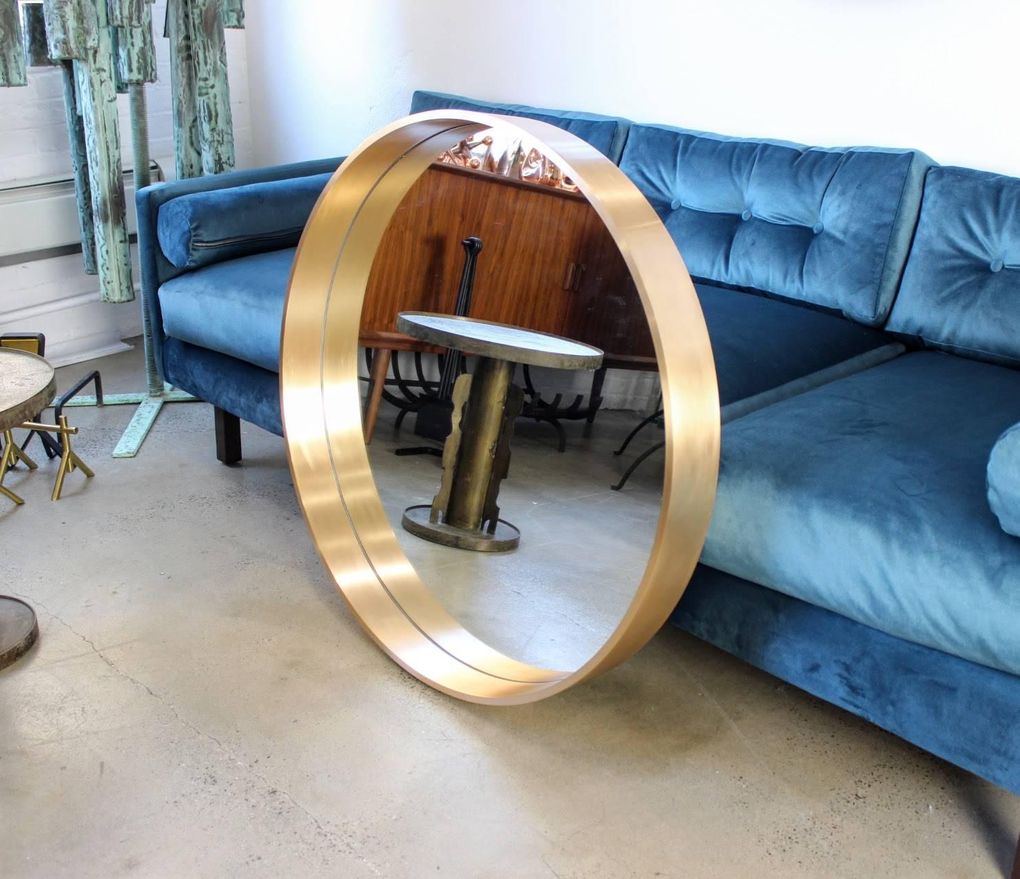 large round brass mirror