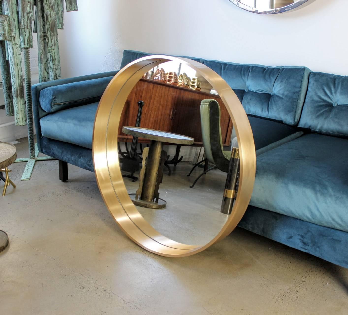 Large round "Oculus" mirror in solid bronze by Refine Limited. This monumental modern mirror is hand-forged in the USA and made with the highest quality craftsmanship and materials. Size shown here is 34" in diameter but can be