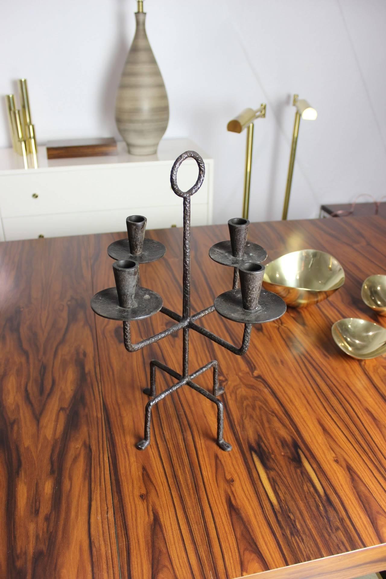Large wrought iron candelabrum in the style of Tommi Parzinger, 1950s

Various Patinas Available:

Light Antique
Dark Antique
Burnished Bronze
Brushed Brass
Mirrored Brass
Brushed Stainless Steel 
Mirrored Stainless Steel