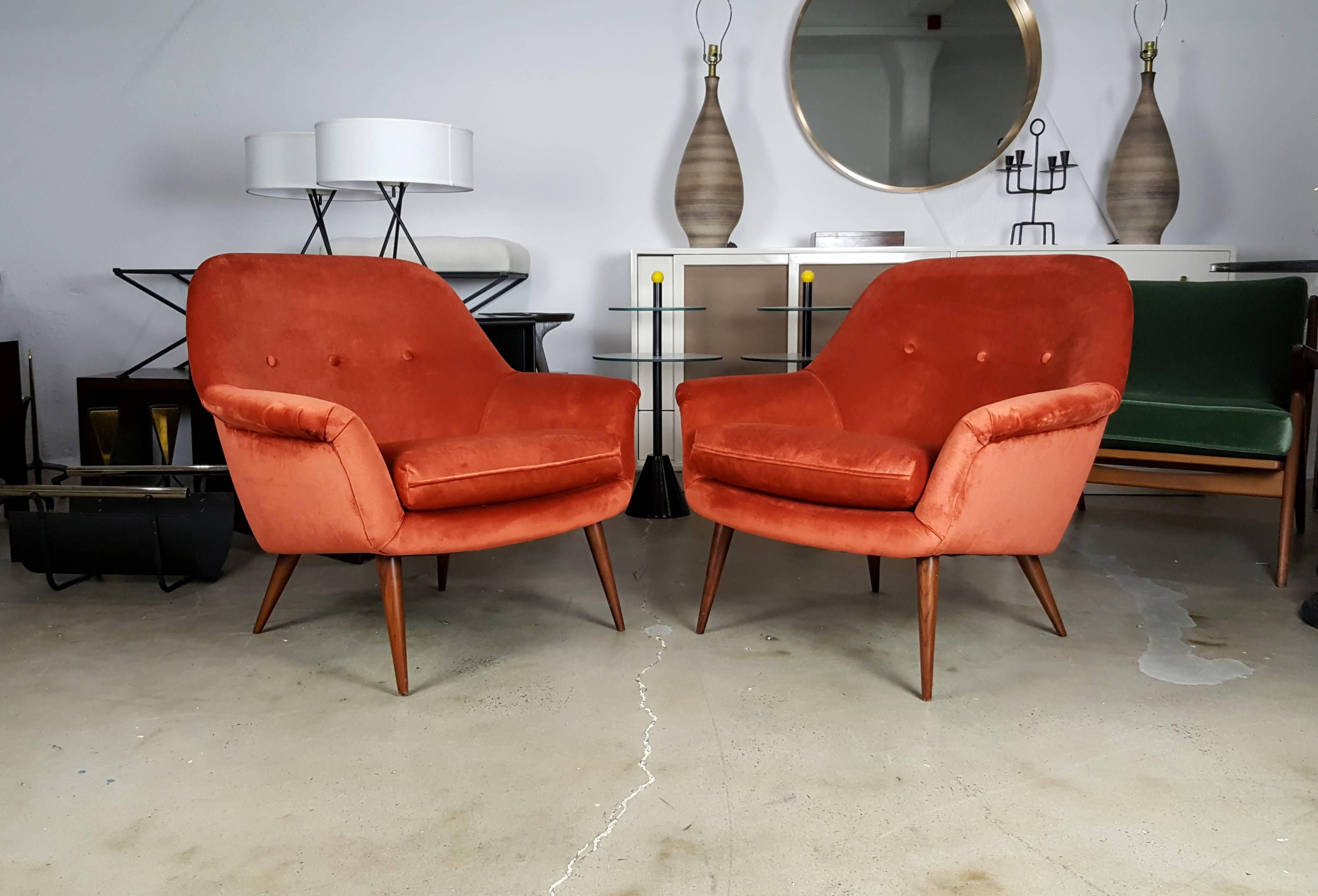 Pair of Italian modern lounge chairs in persimmon velvet. So comfortable and excellent quality.

See this item in our private NYC showroom! Refine Limited is located in the heart of Chelsea at the history Starrett-LeHigh Building, 601 West 26th