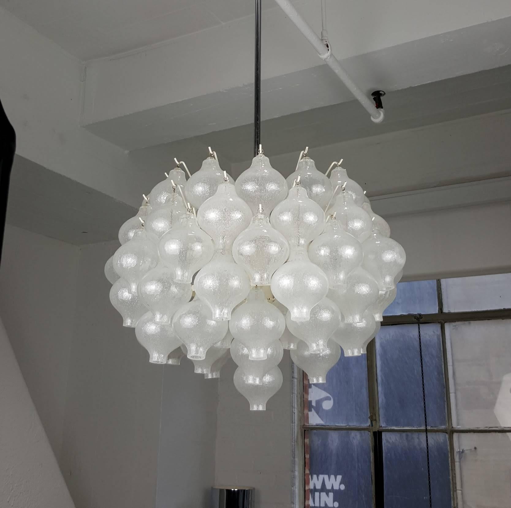 Large blown glass chandelier by Kalmar, Vienna. This is a rather large example of the chandelier. Glass sconces are bulbous  forms. Excellent condition with a few minor losses that are not visible in use.

Total height is 38" but can be