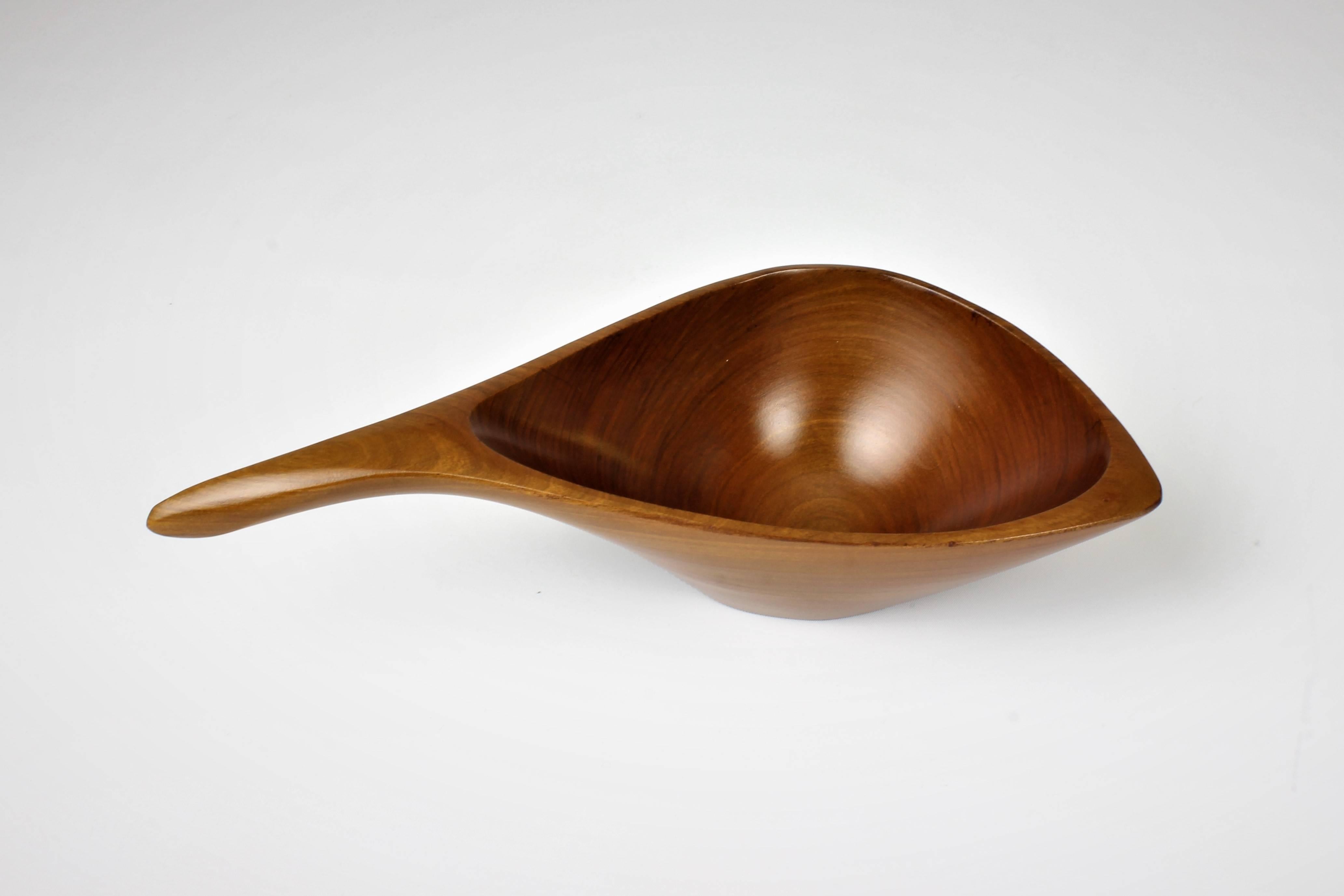 Emil Milan handmade decorative and functional nut bowl in Lapacho Wood, 1970s. 

 Emil Milan (May 17, 1922-April 5, 1985) was an American woodworker known for his carved bowls, birds, and other accessories and art in wood. Trained as a sculptor at