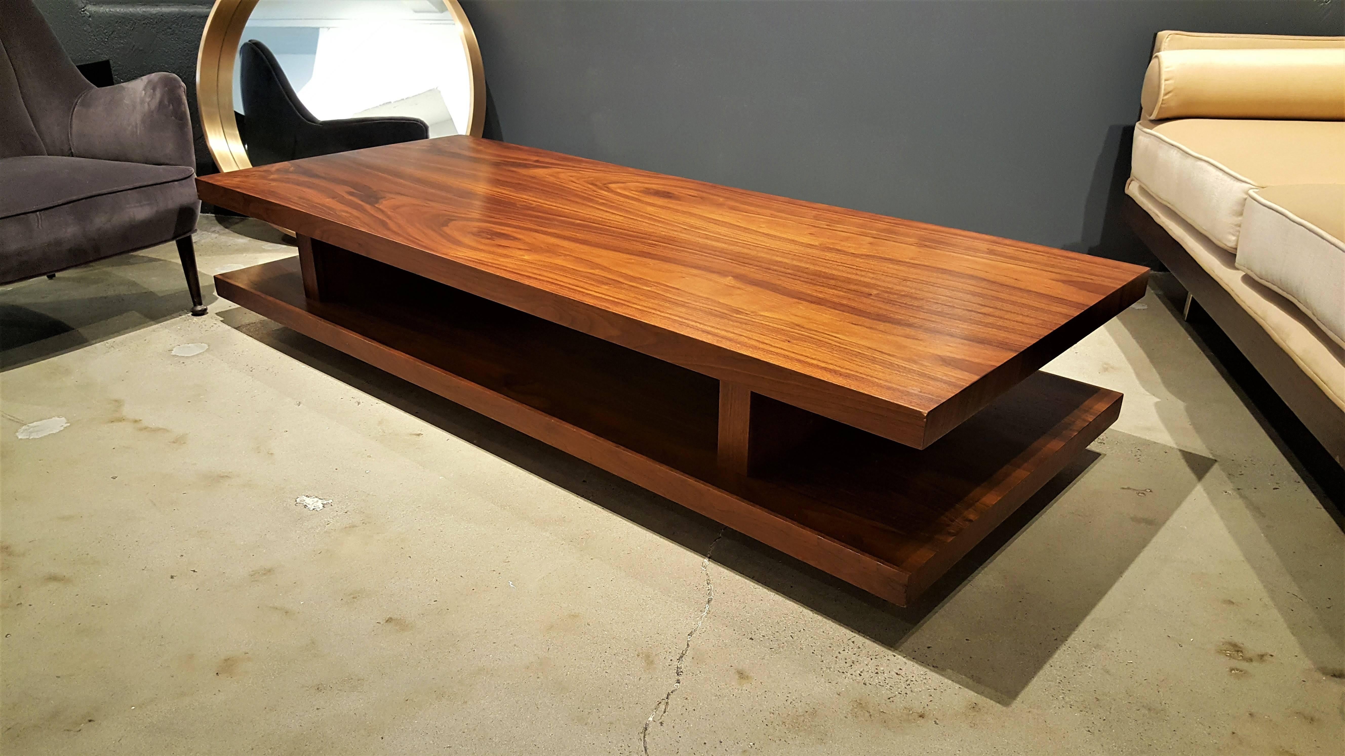 Very large rectangle walnut coffee table with wicked wood grain, 1970s. Simply stunning. Incredible scale with two tiers for additional storage. Modern lines that would go great with contemporary setting or even a farmhouse rustic feel. On