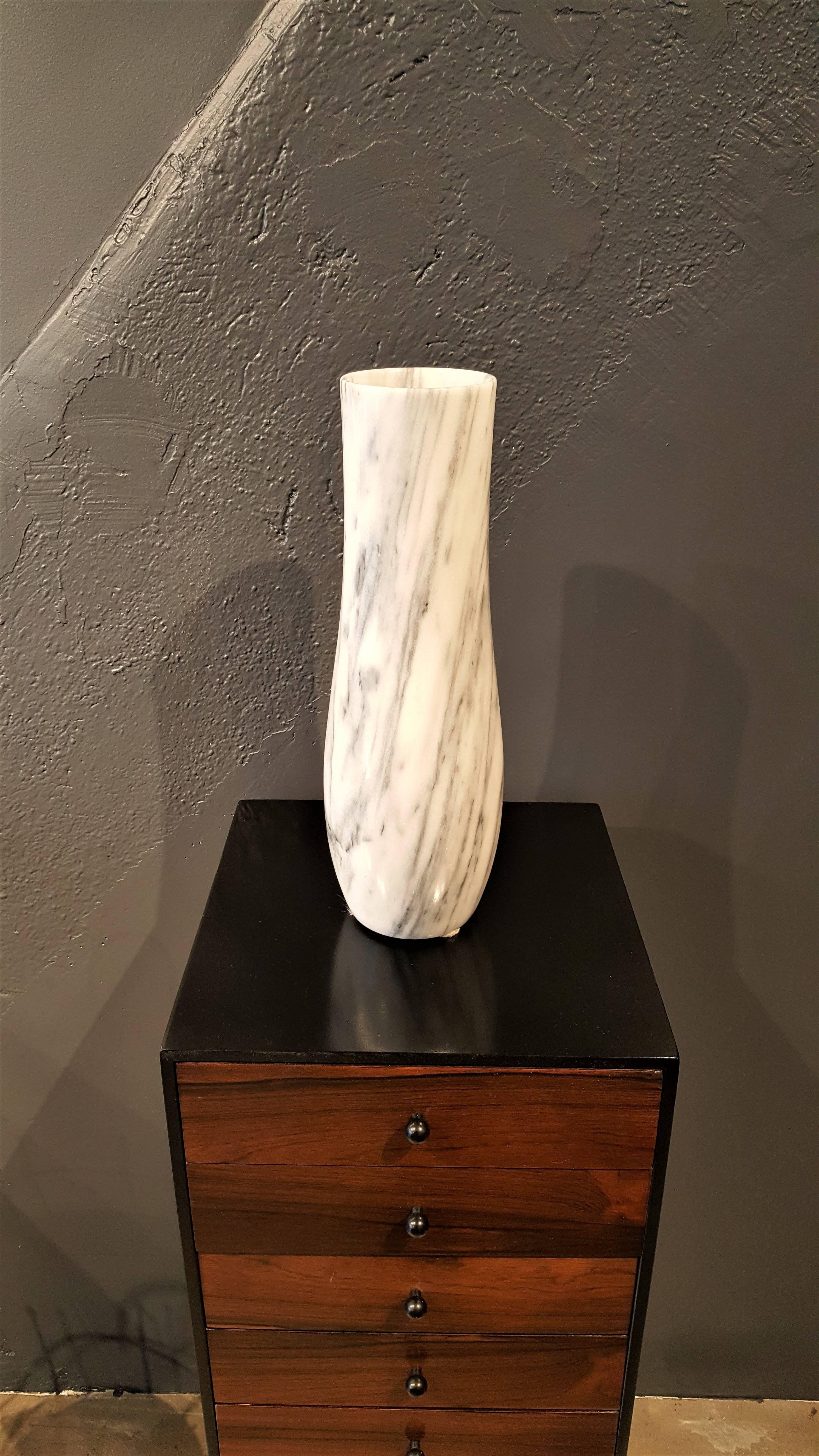 Massive Carrara Marble Vase with Dramatic Striations, Italy 1950s. Excellent condition. Would make for a gorgeous centerpiece on a dining table, mantel or in a foyer or entryway. 

Whether furnishing a contemporary Soho loft or stylish post-war Park