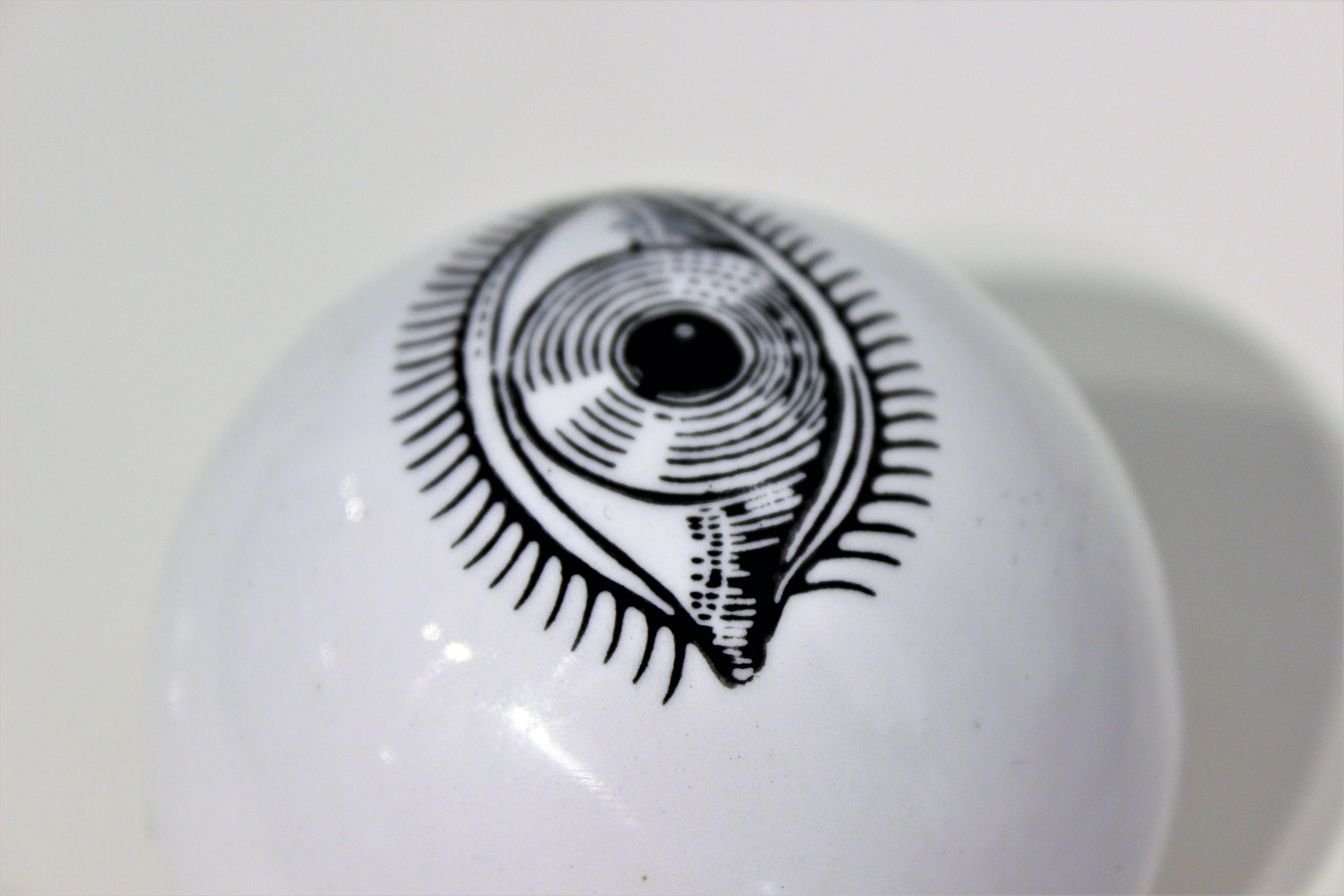 fornasetti eyeball paperweight